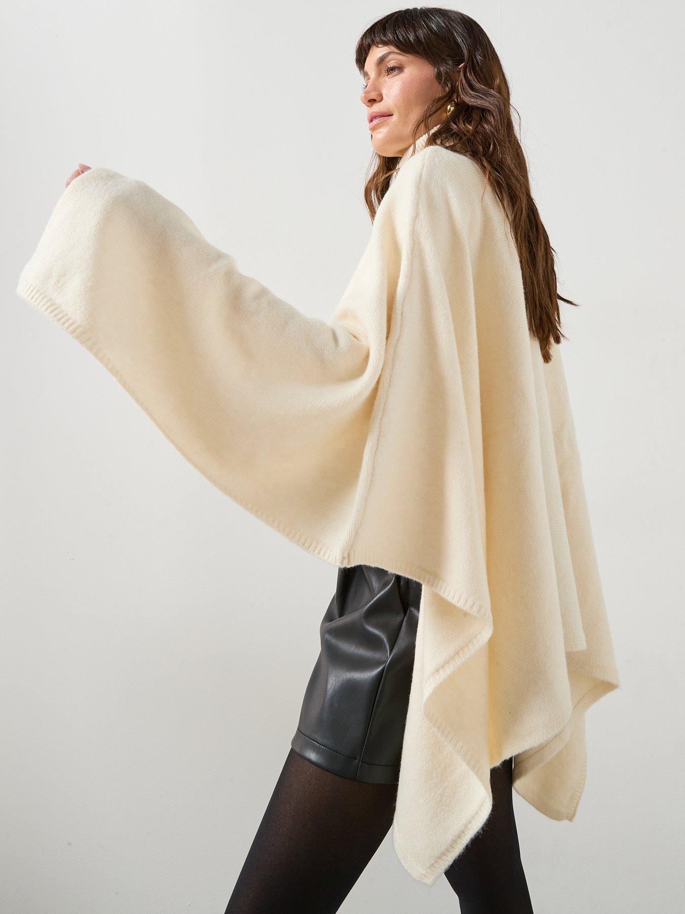 Image 1 of 6 of Mango Knitted Turtleneck Cape - Beige
