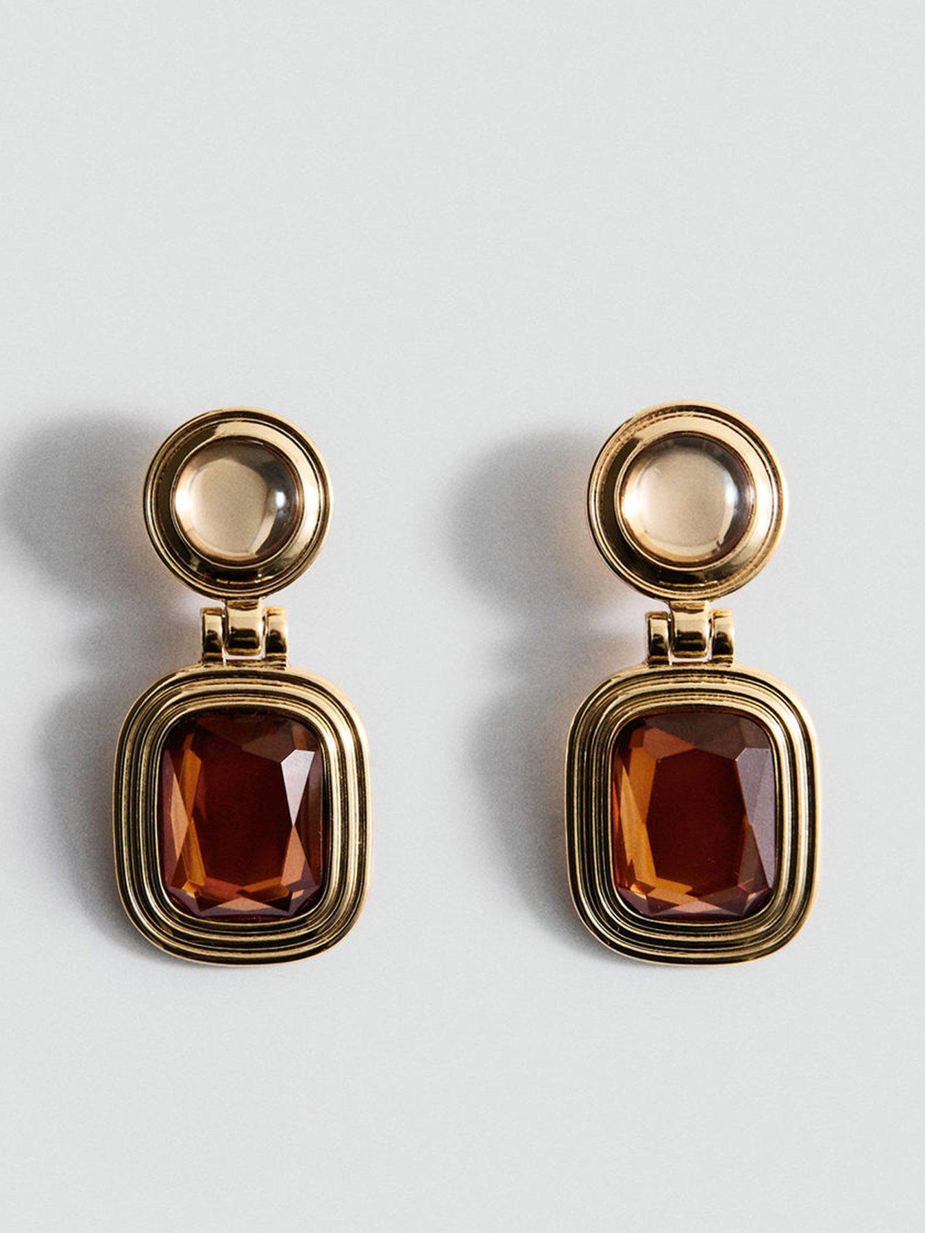 front image of mango-combined-resin-hanging-earrings-gold