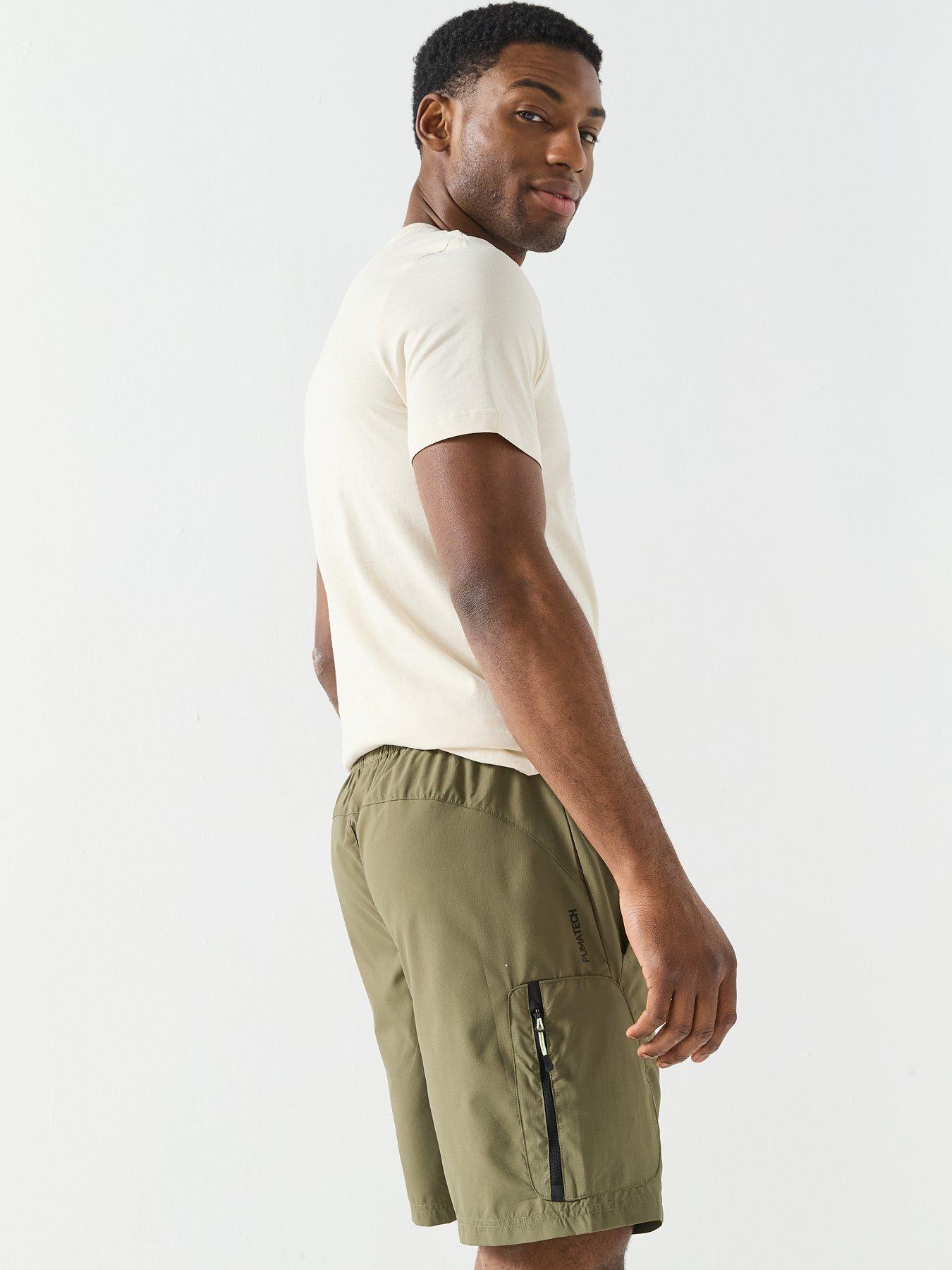  image of puma-mens-tech-woven-cargo-shorts-green