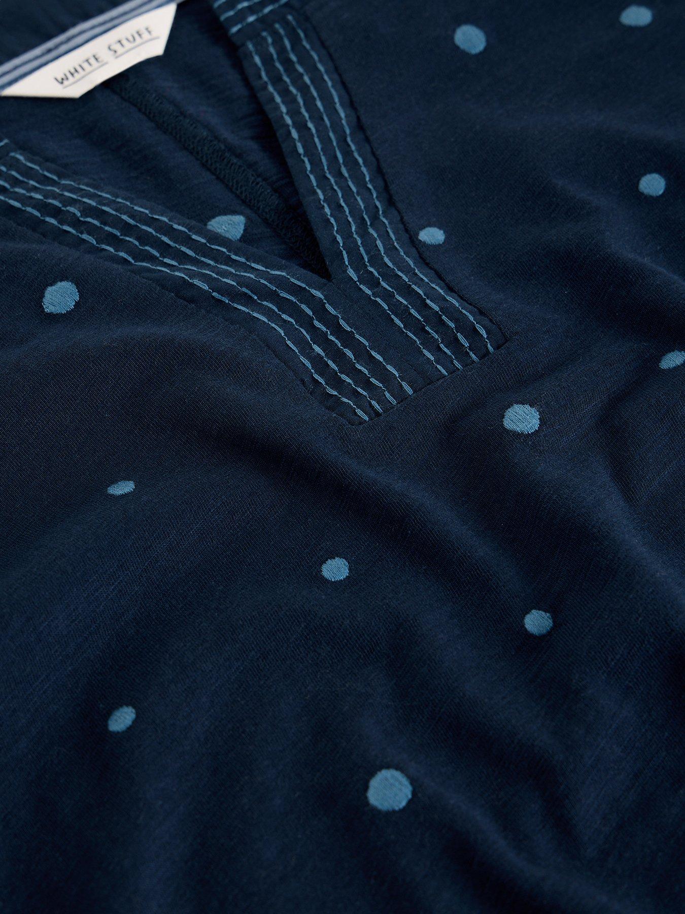  image of white-stuff-weaver-ls-notch-emb-tee