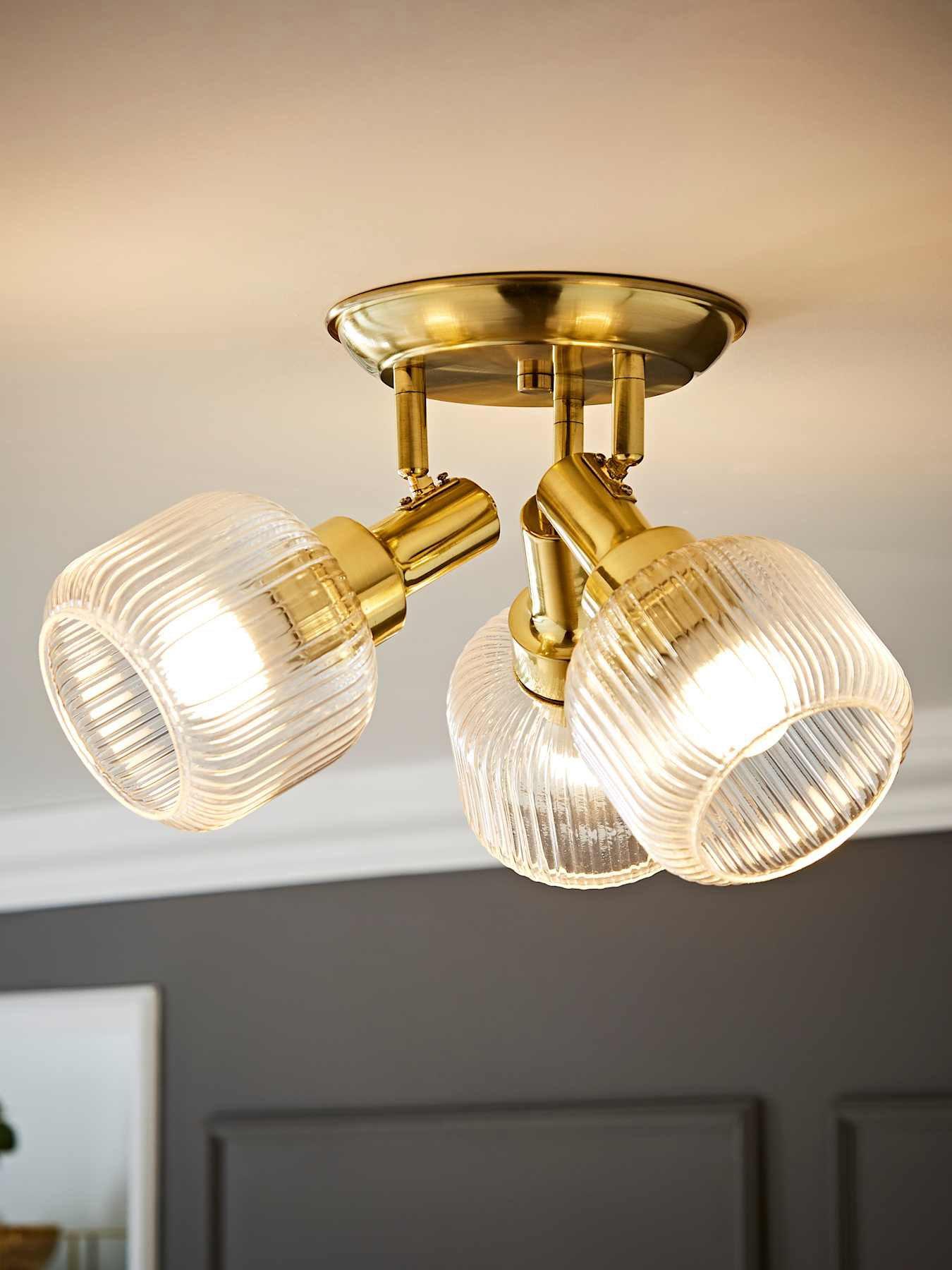Image 1 of 6 of ValueLights Calpe 3 Way Antique Brass Adjustable Ceiling Spotlight with Ribbed Clear Shades