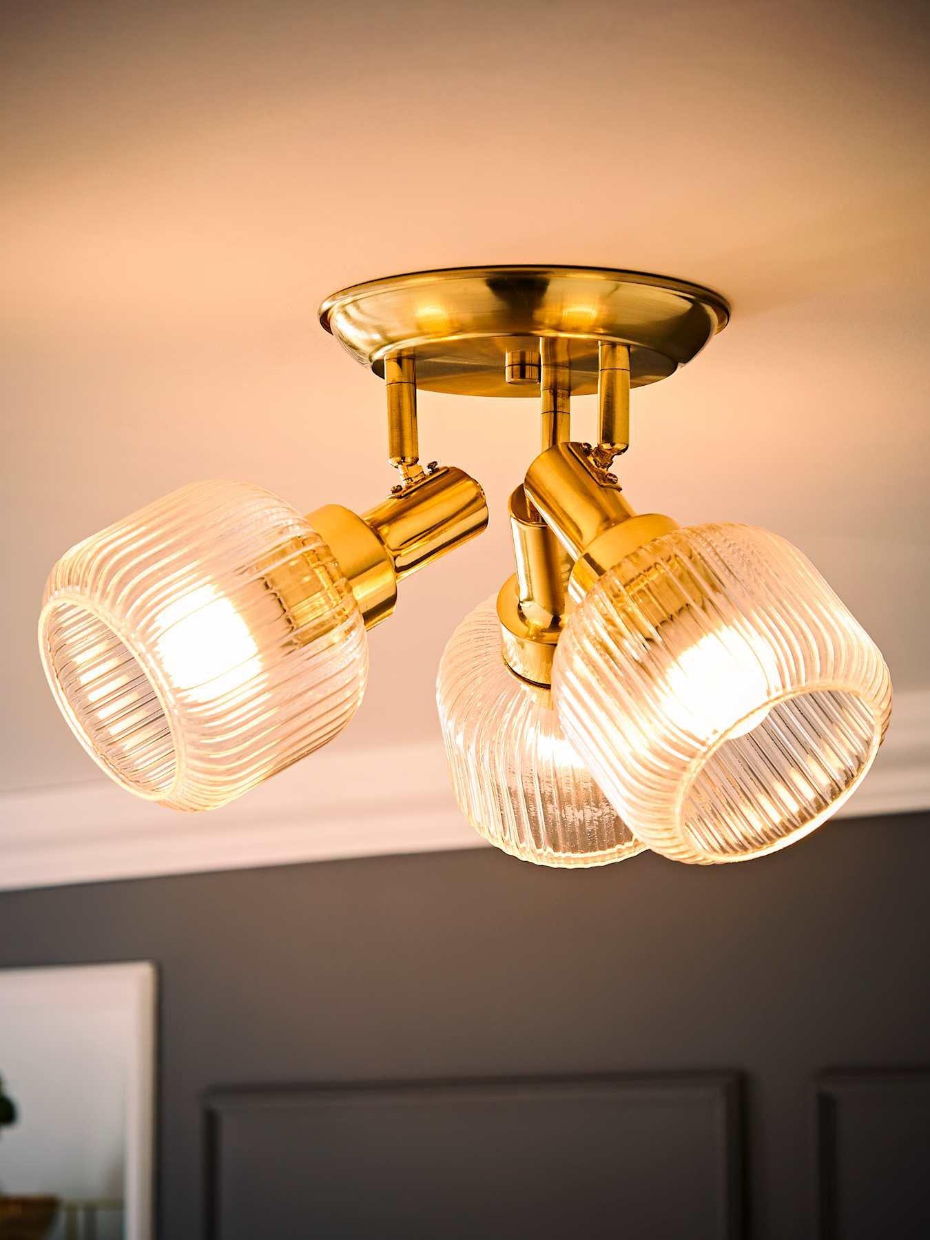 Image 3 of 6 of ValueLights Calpe 3 Way Antique Brass Adjustable Ceiling Spotlight with Ribbed Clear Shades