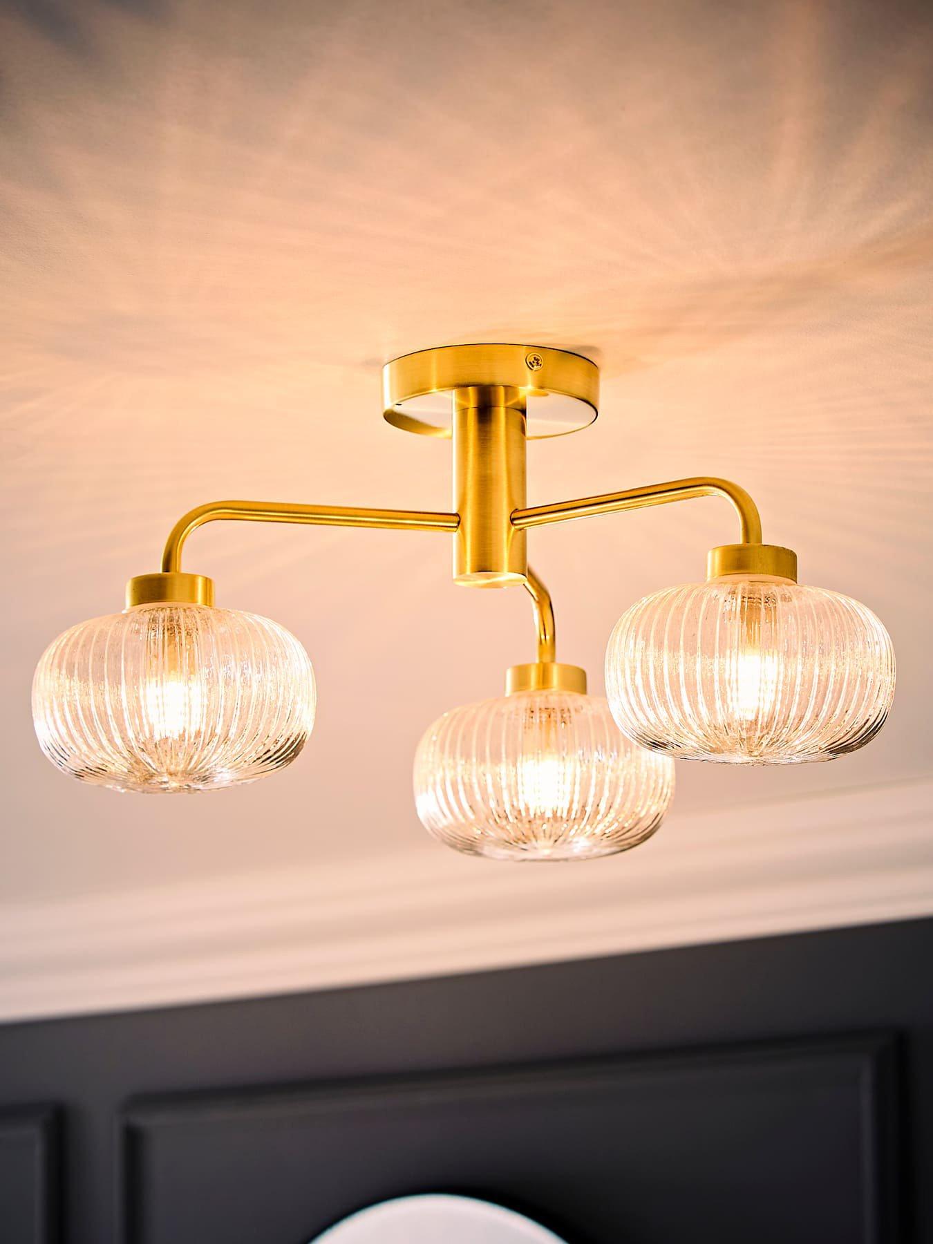 Image 3 of 6 of ValueLights Amaia Brushed Gold IP44 Rated 3 Way Clear Ribbed Glass Ceiling Light