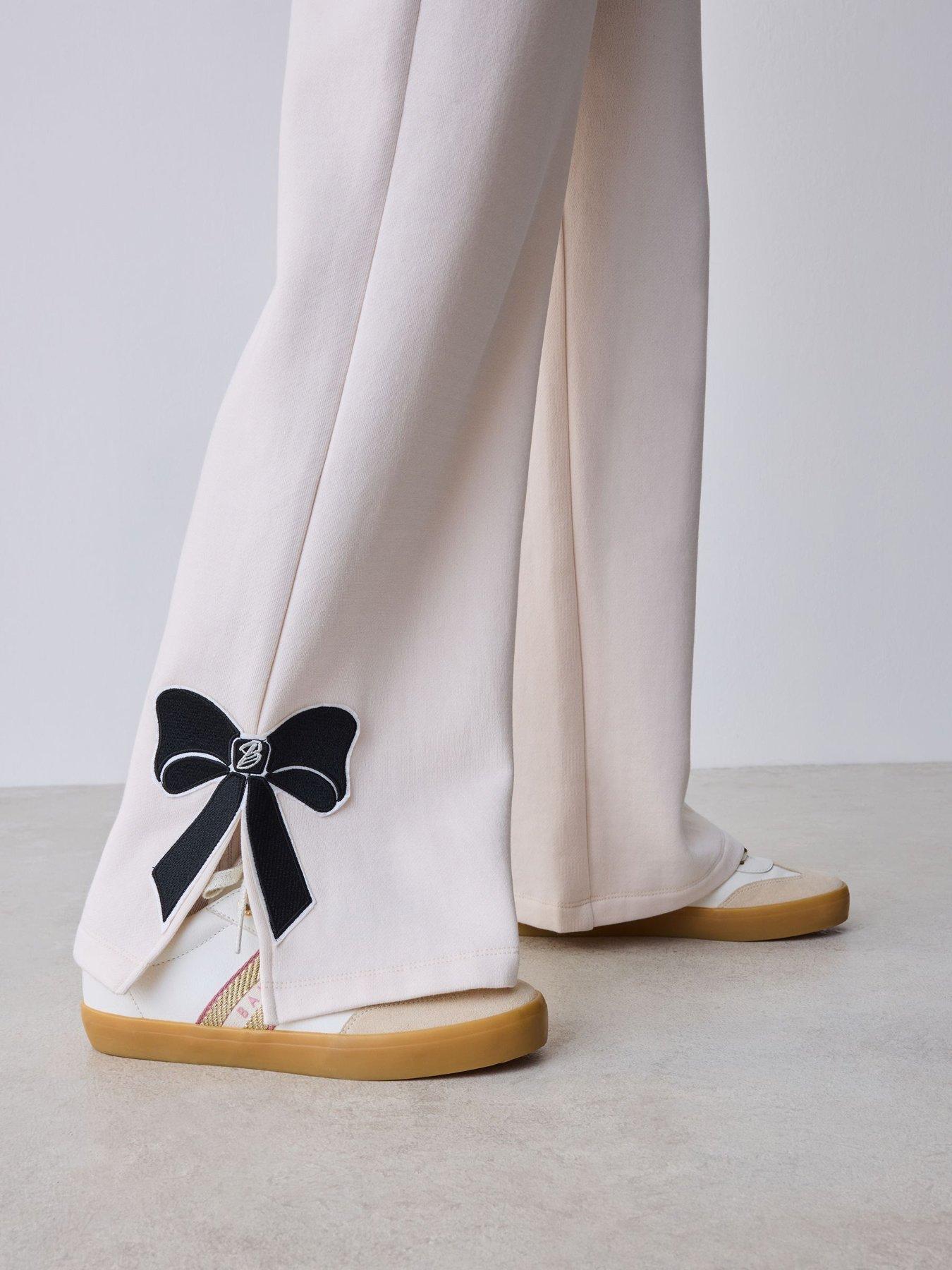 Image 6 of 7 of Ted Baker Girls Bow Detail Long Sleeve Sweatshirt Top and Split Hem Joggers Set - Cream