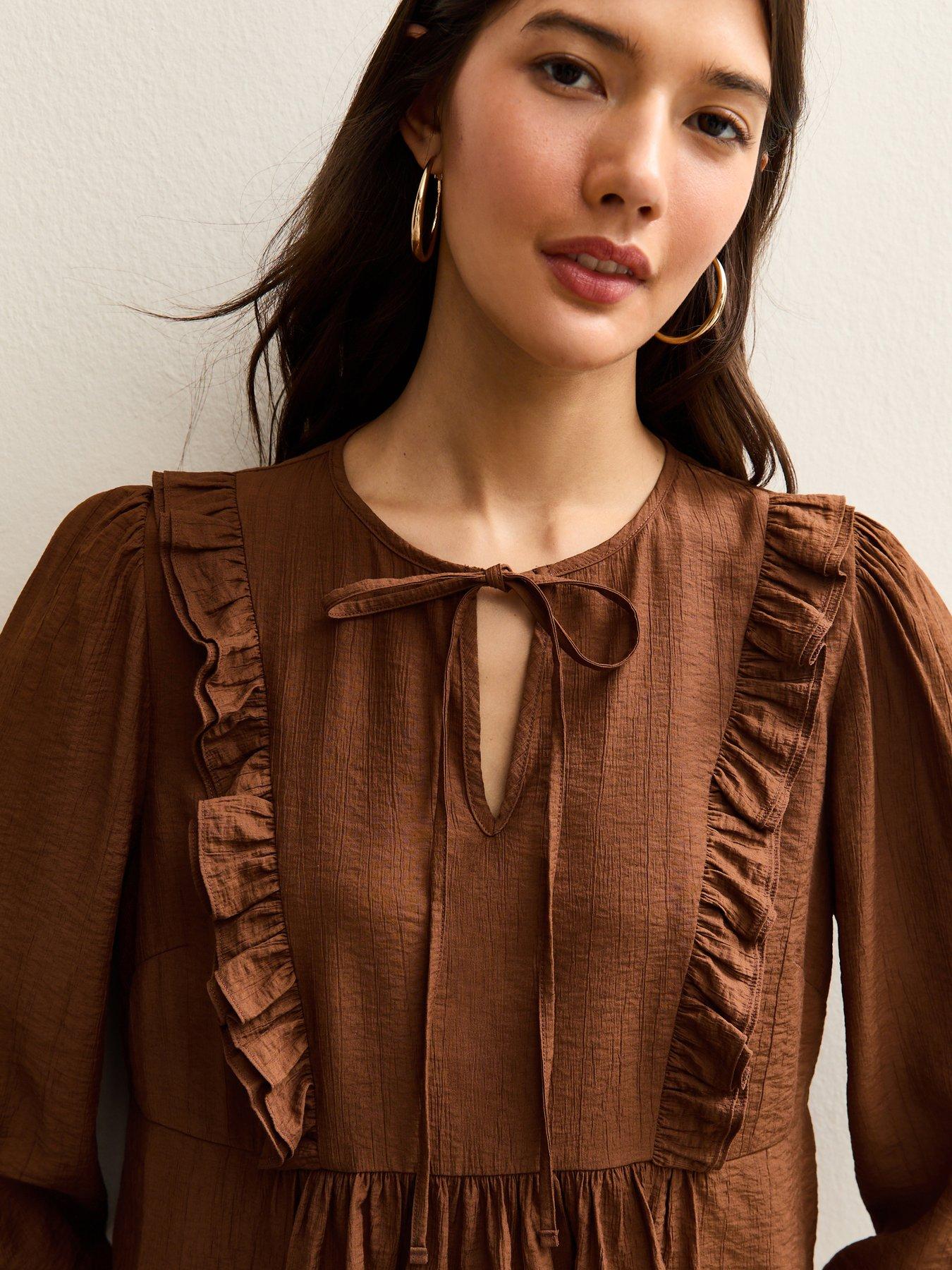  image of new-look-mid-ruffle-tie-long-sleeve-blouse-brown