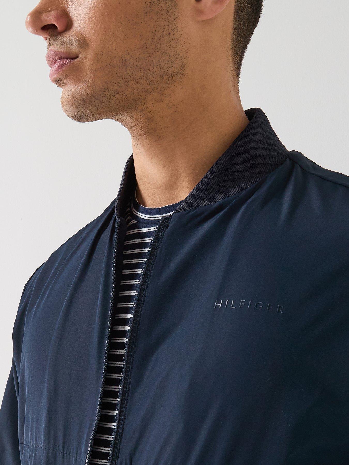  image of tommy-hilfiger-relaxed-fit-softshell-bomber-jacket-beige