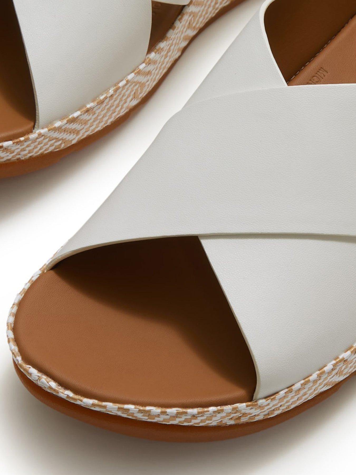 Image 6 of 6 of FitFlop Lulu Lux Graphic Weave Leather Cross Sandals - White