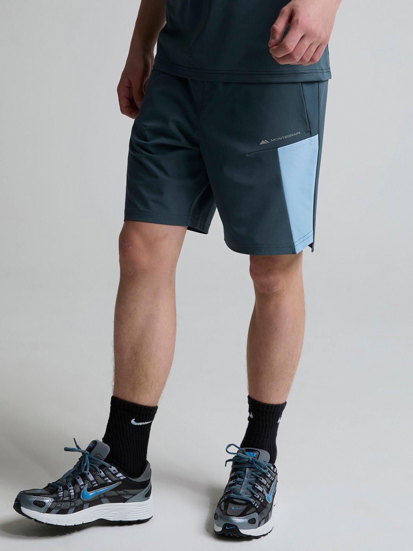 image of monterrain-kids-deflect-woven-short-blue