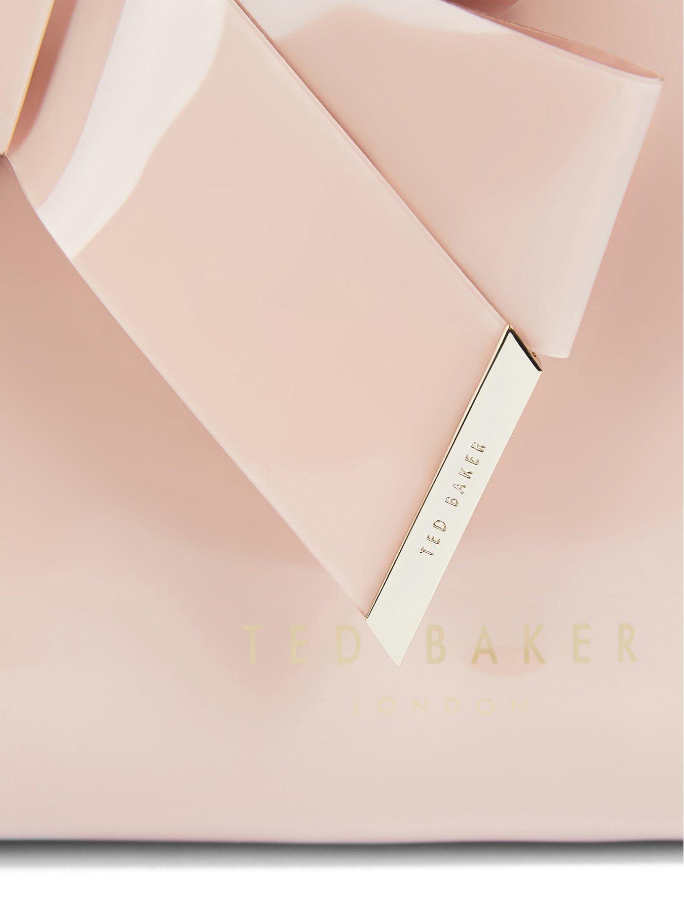  image of ted-baker-knot-bow-make-up-bag-pink