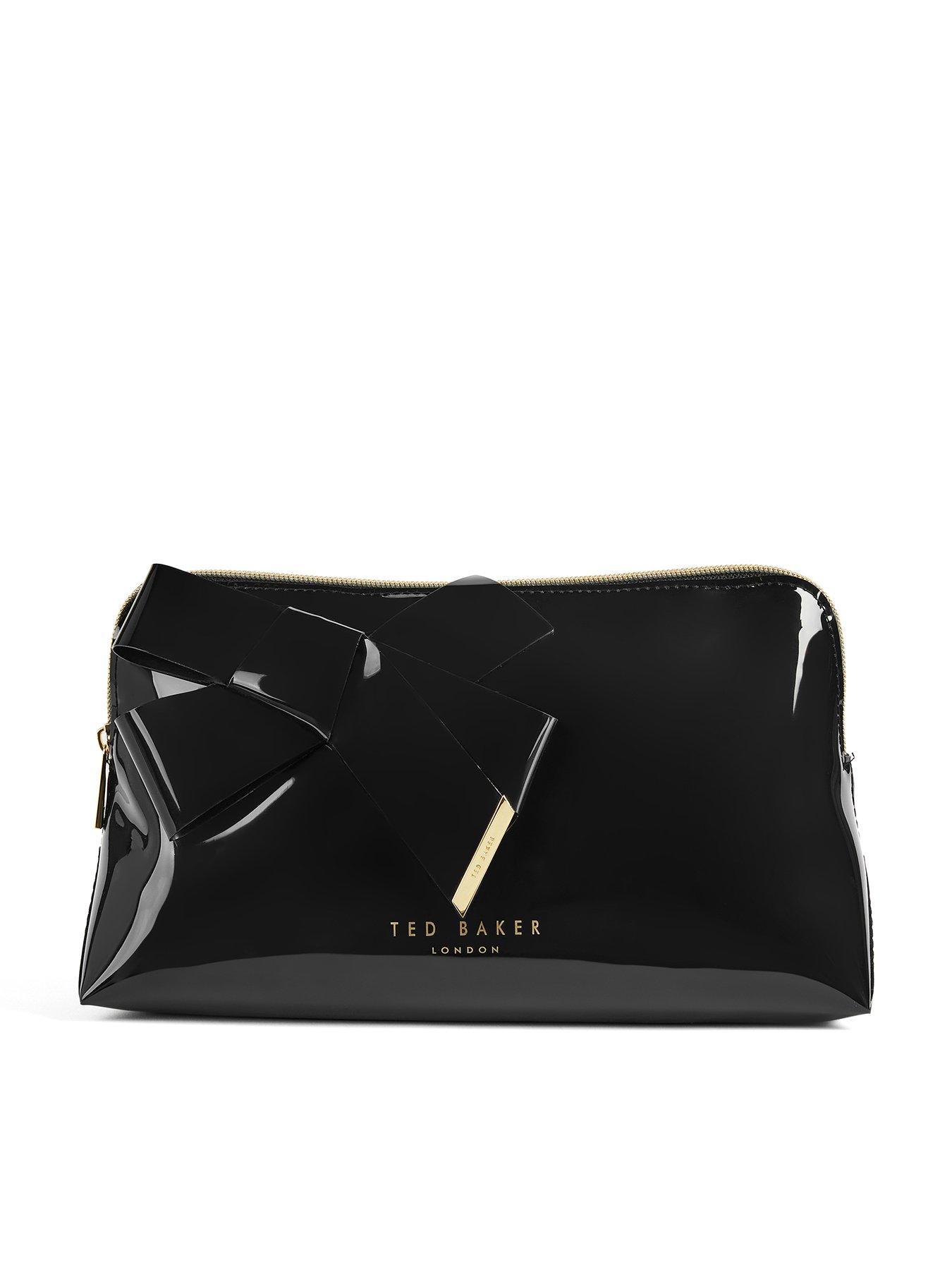  image of ted-baker-bow-patent-make-up-bag-black