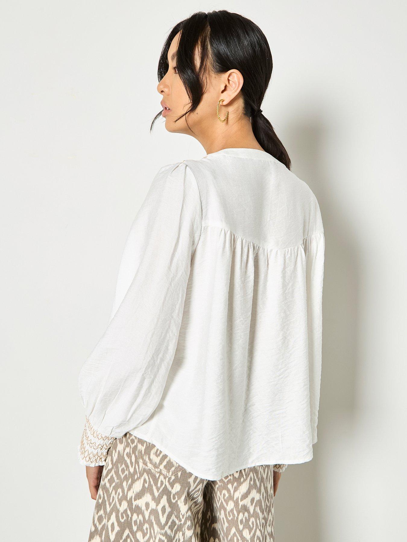  image of apricot-wavy-embroidered-smocked-blouse