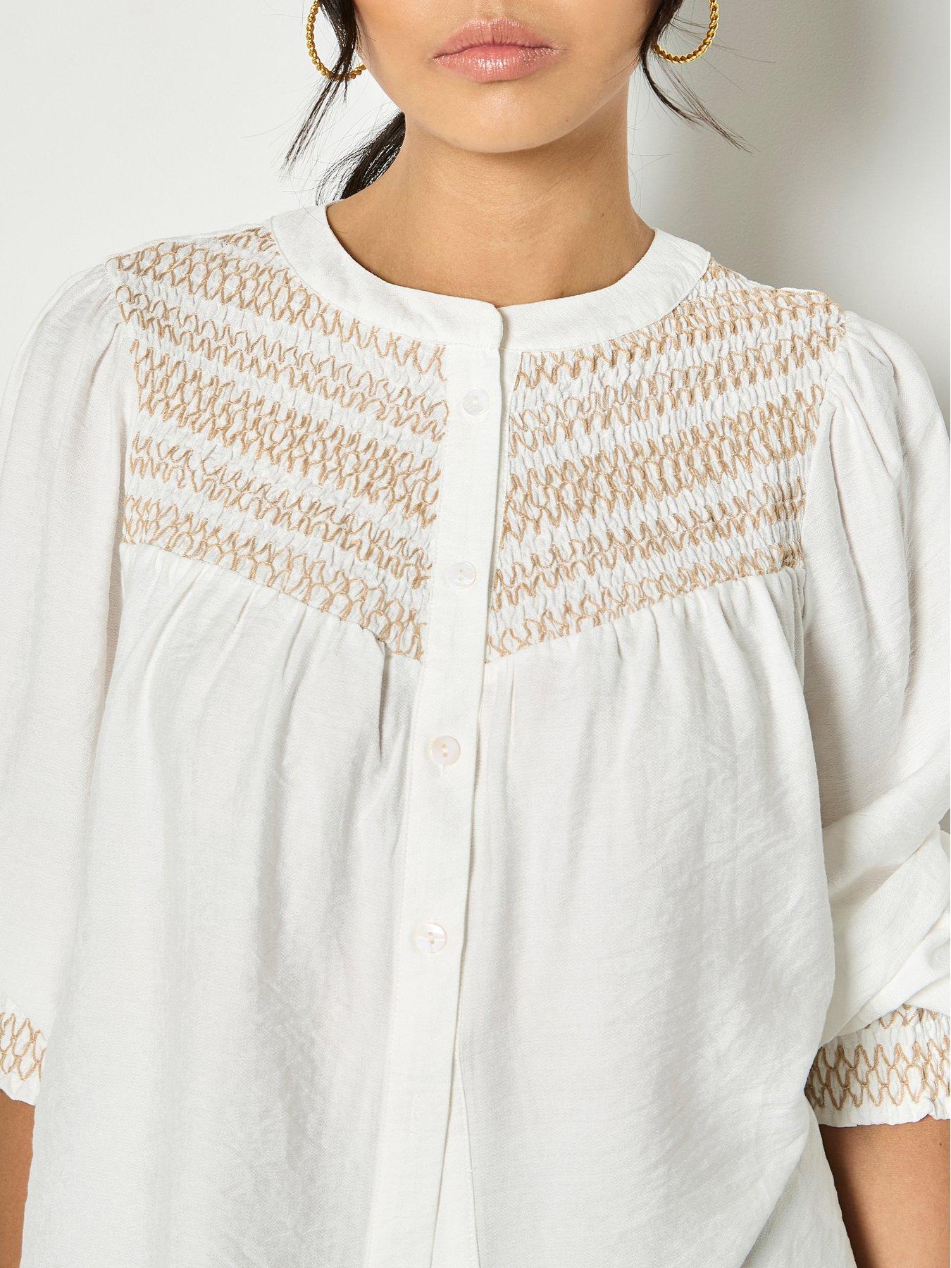  image of apricot-wavy-embroidered-smocked-blouse