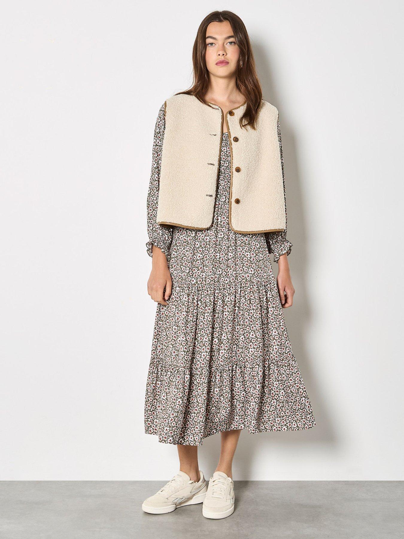  image of apricot-reversible-borg-suede-gilet