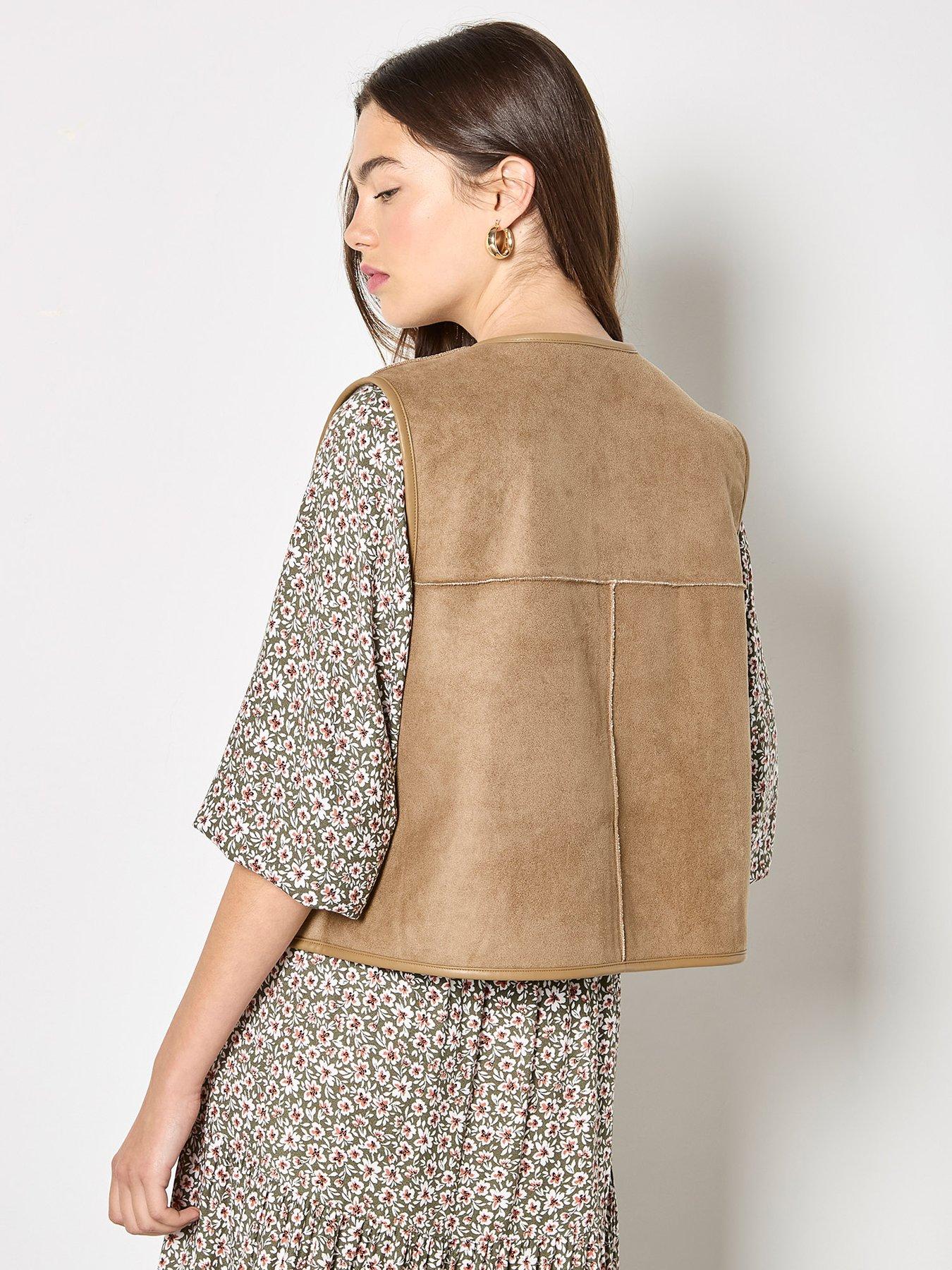  image of apricot-reversible-borg-suede-gilet