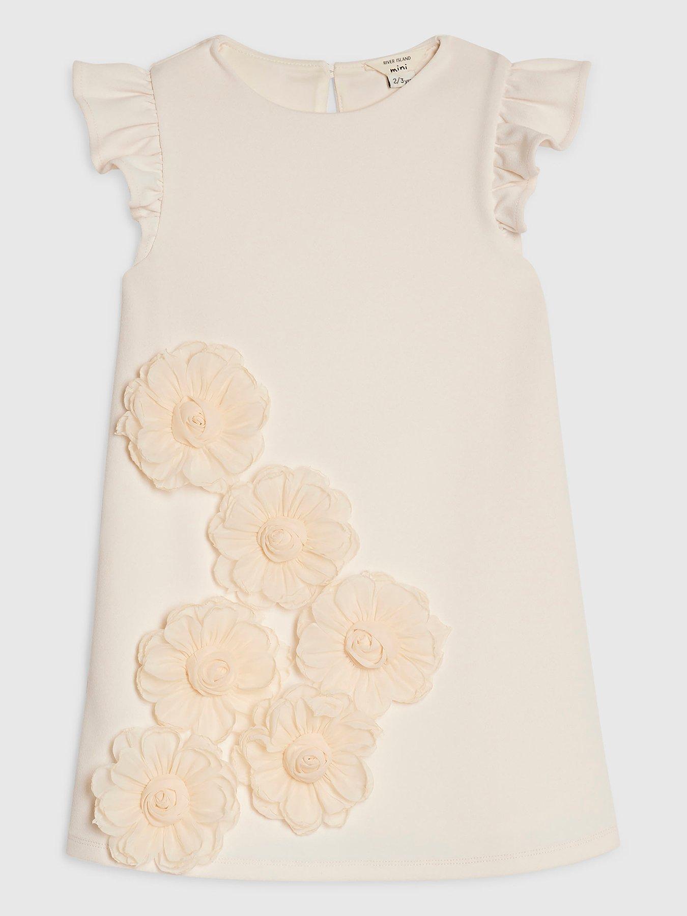 Image 1 of 4 of River Island Mini Girls Rosette Shift Dress - Beige