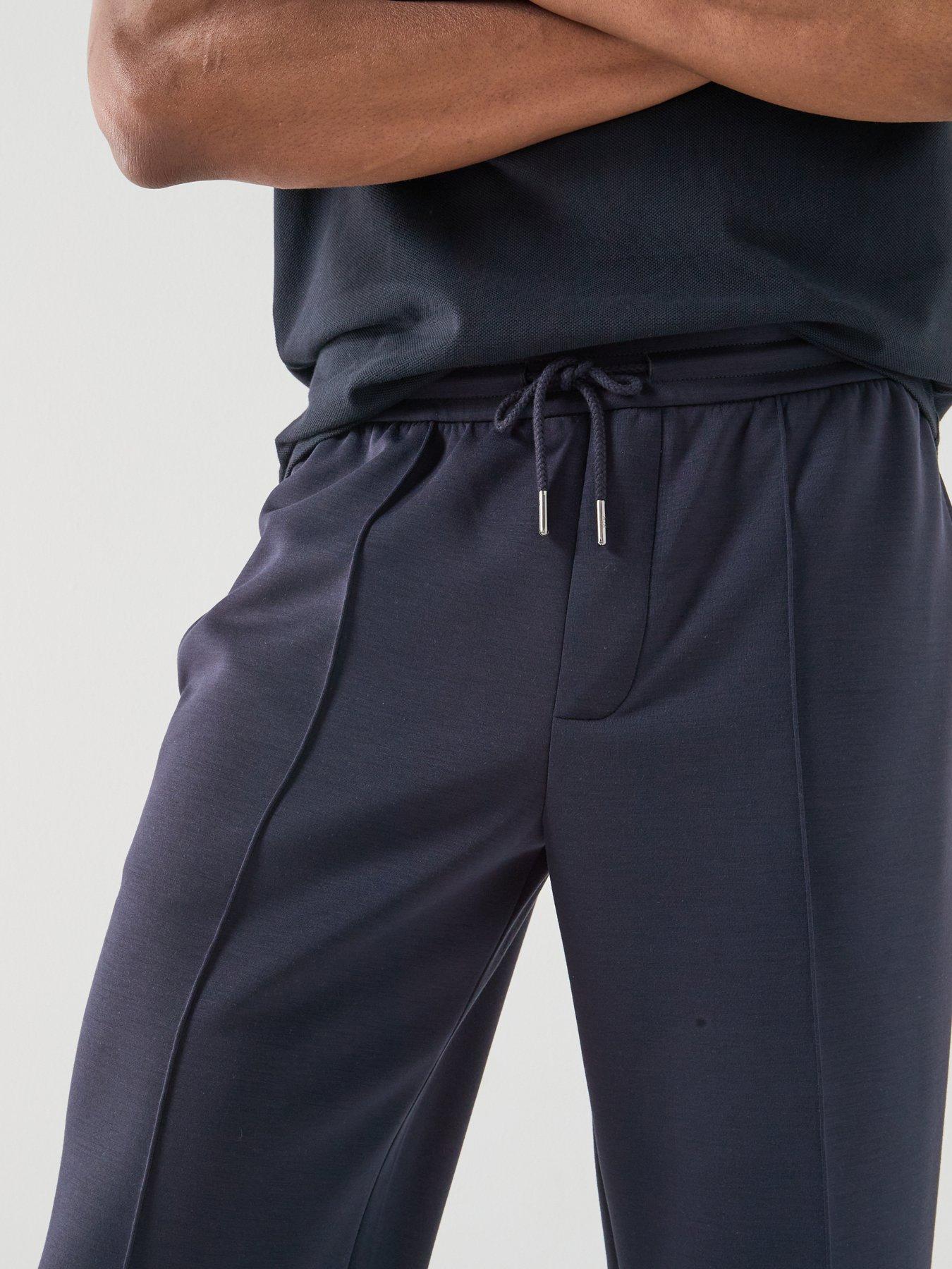  image of armani-exchange-straight-legged-jersey-trousers-navy