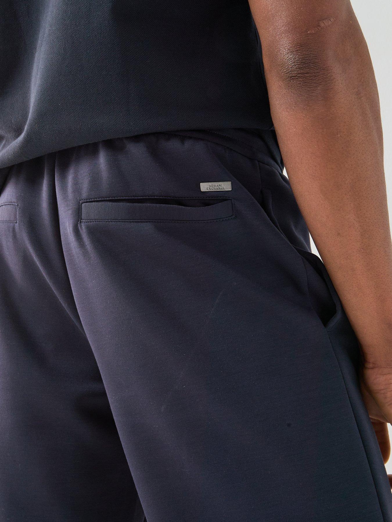  image of armani-exchange-straight-legged-jersey-trousers-navy