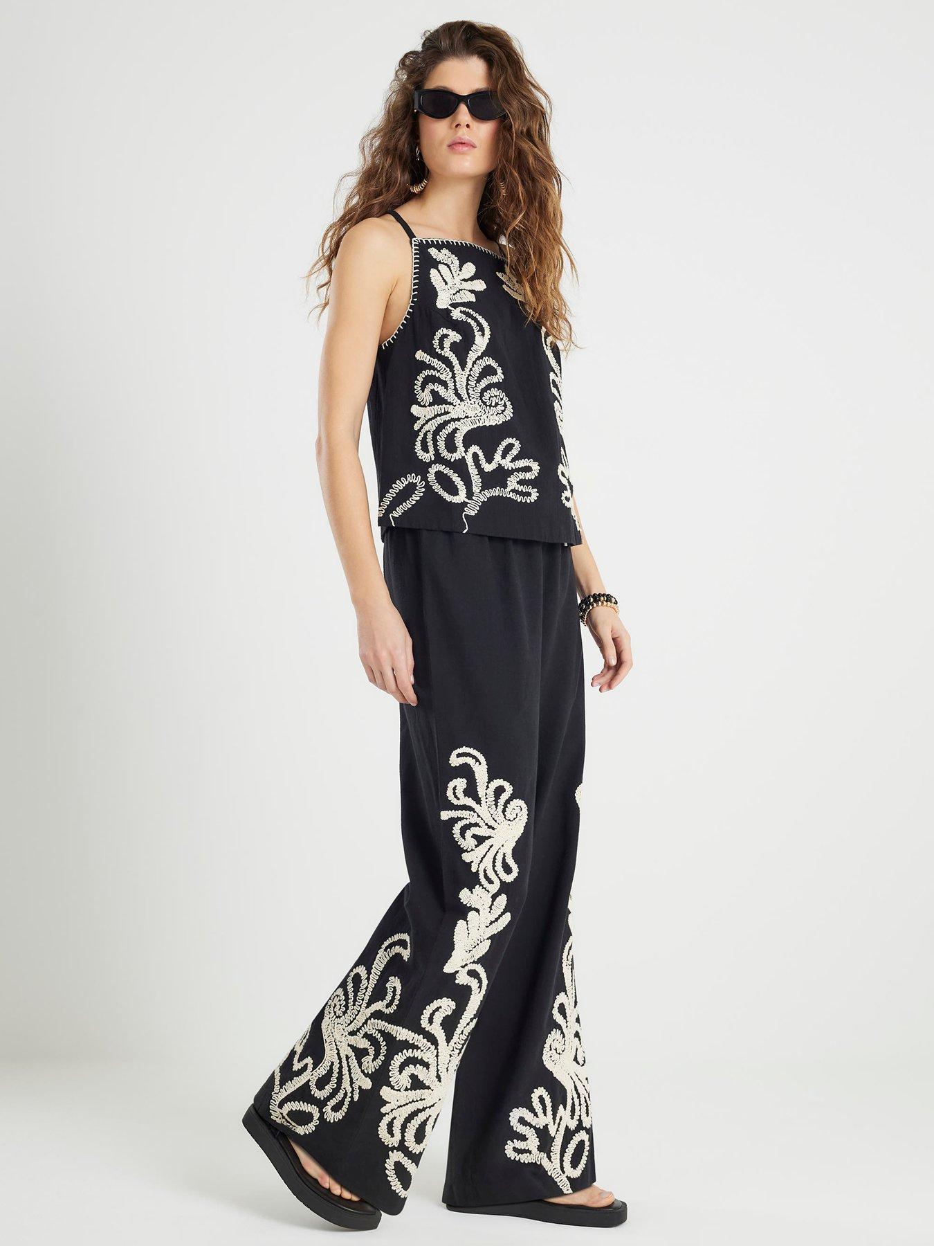 Image 1 of 4 of River Island Craft Stitch Trouser - Black