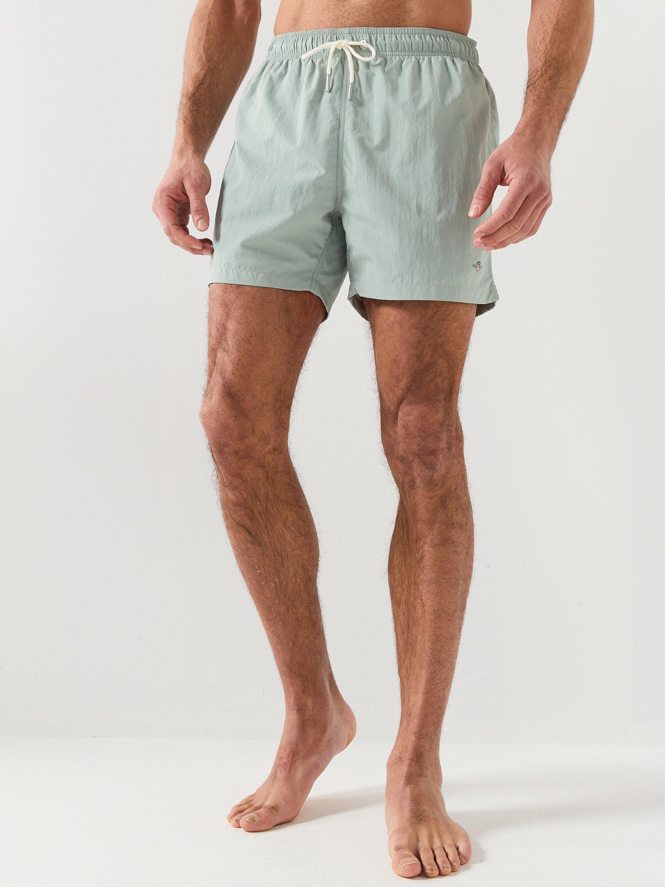 front image of gant-logo-swim-shorts-light-grey
