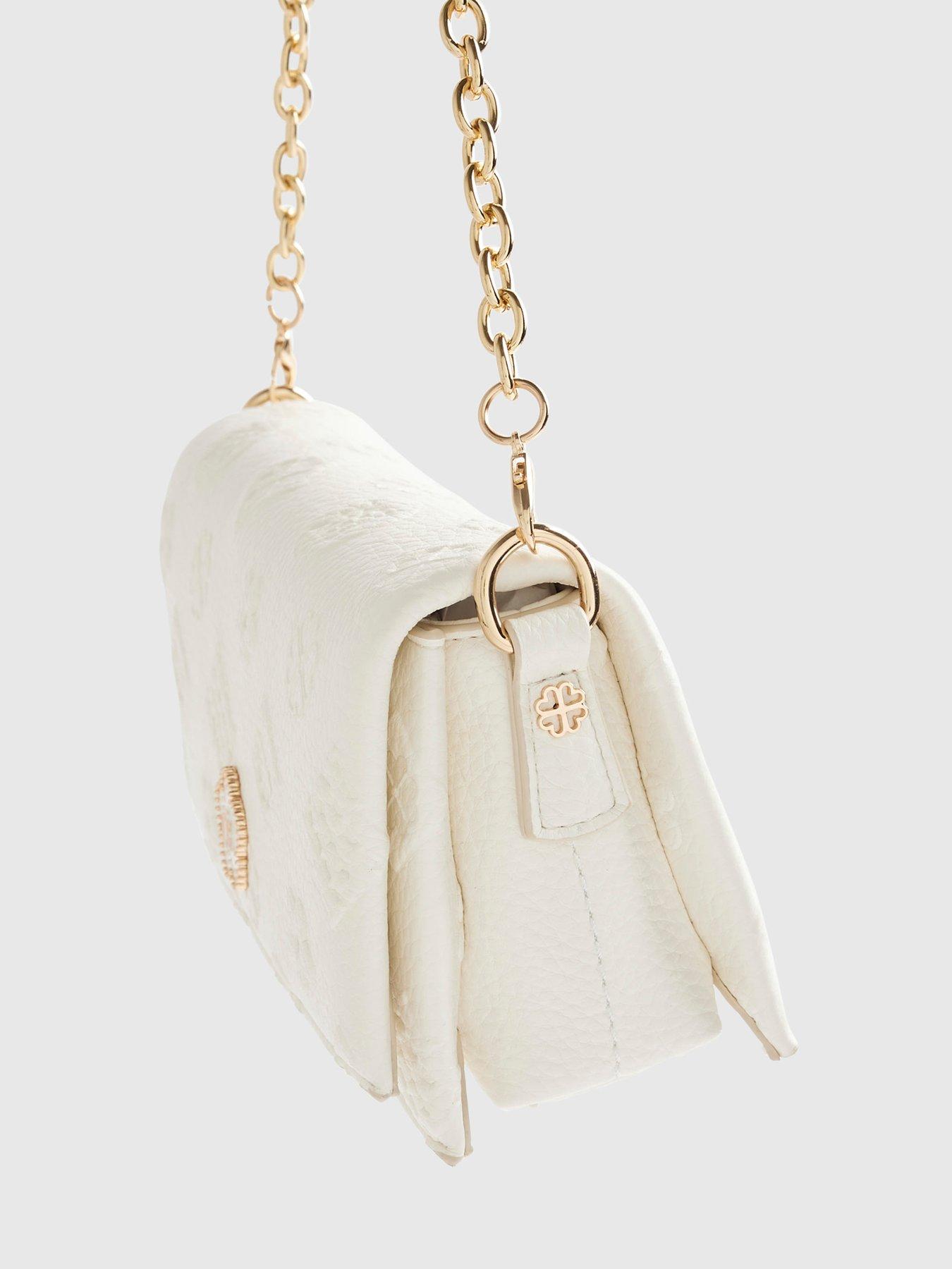  image of river-island-embossed-monogram-cross-body-bag-cream