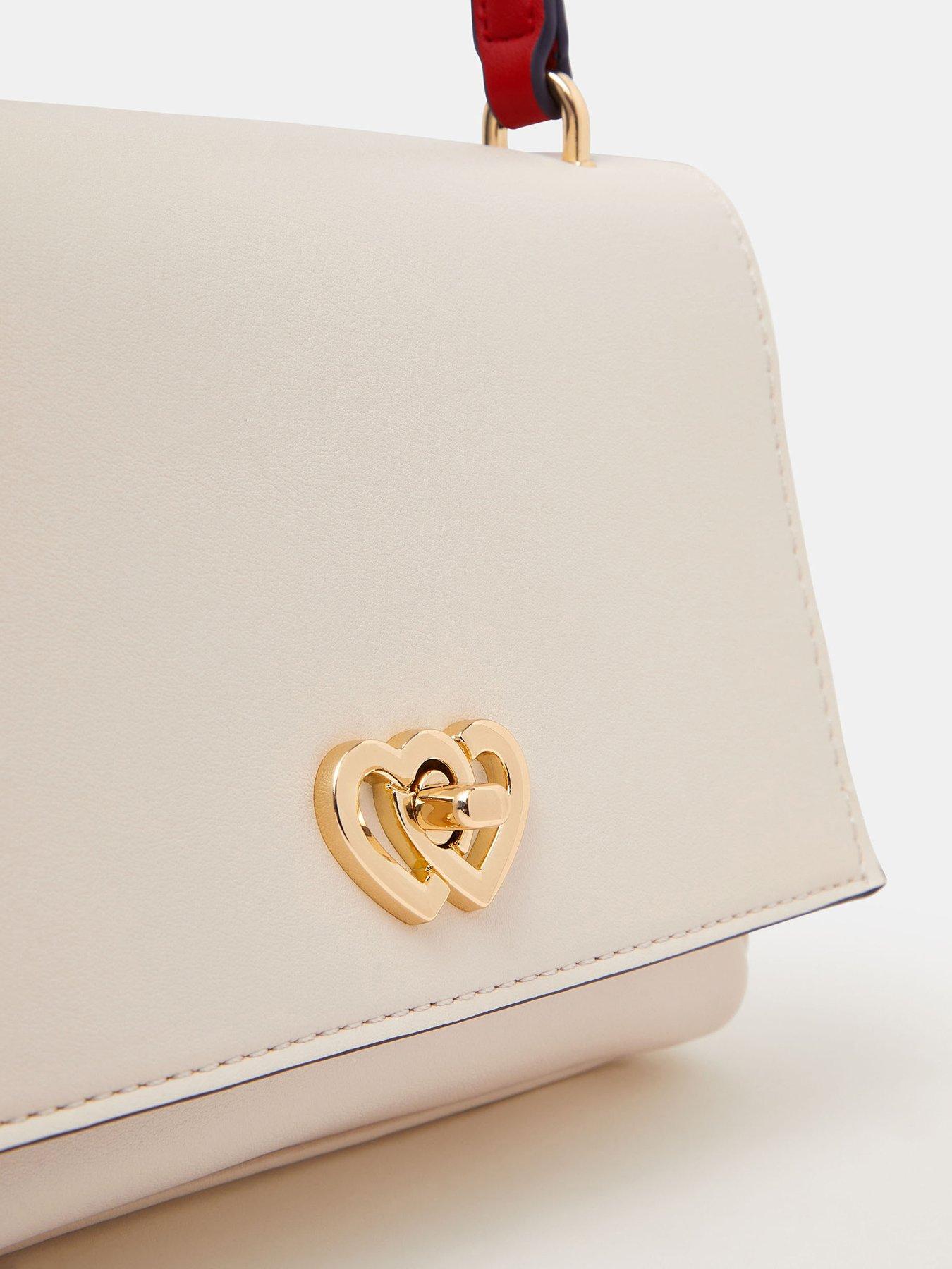  image of accessorize-double-heart-crossbody-handbag-cream