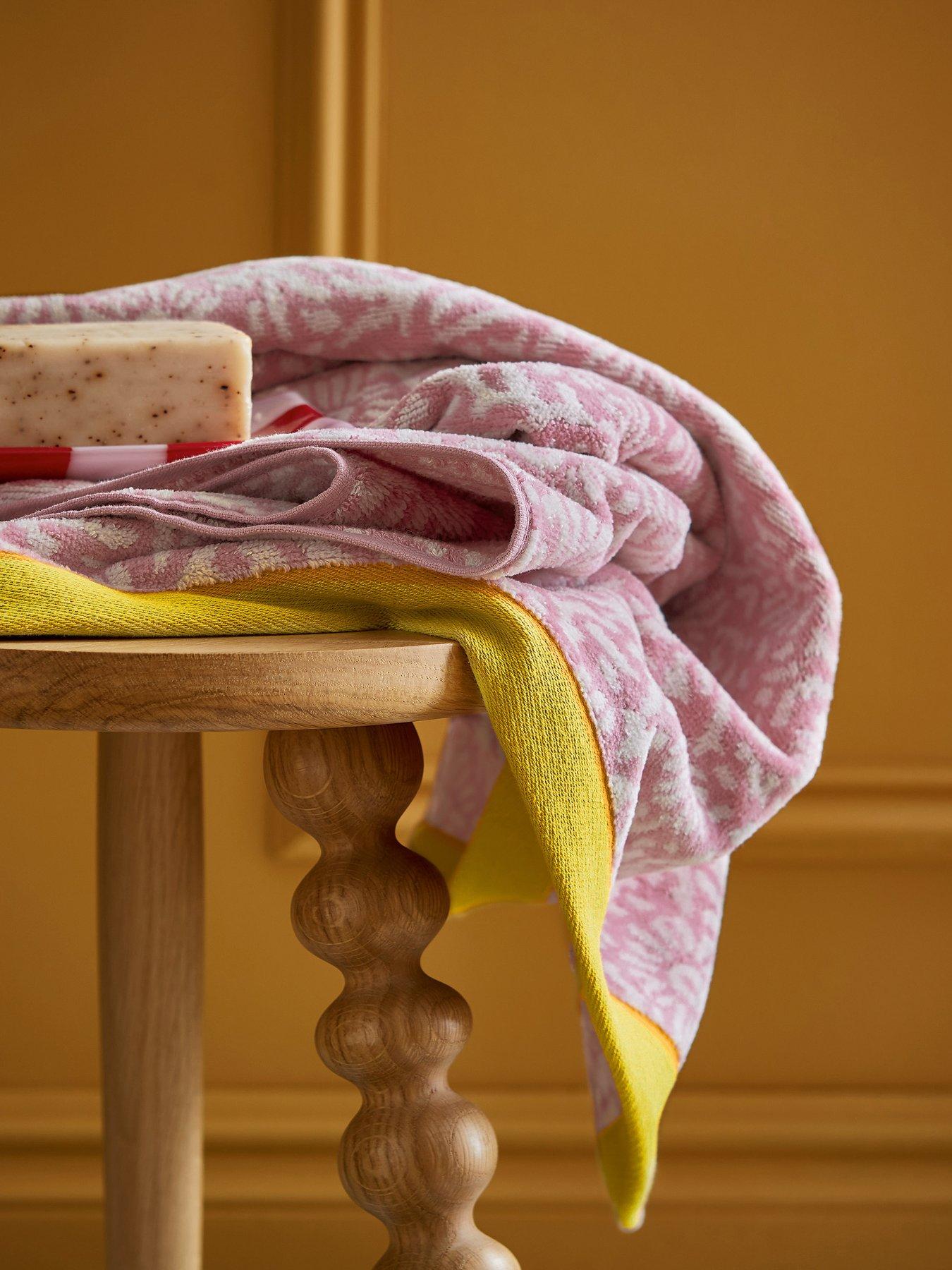 front image of land-shore-aster-bath-sheet-multi