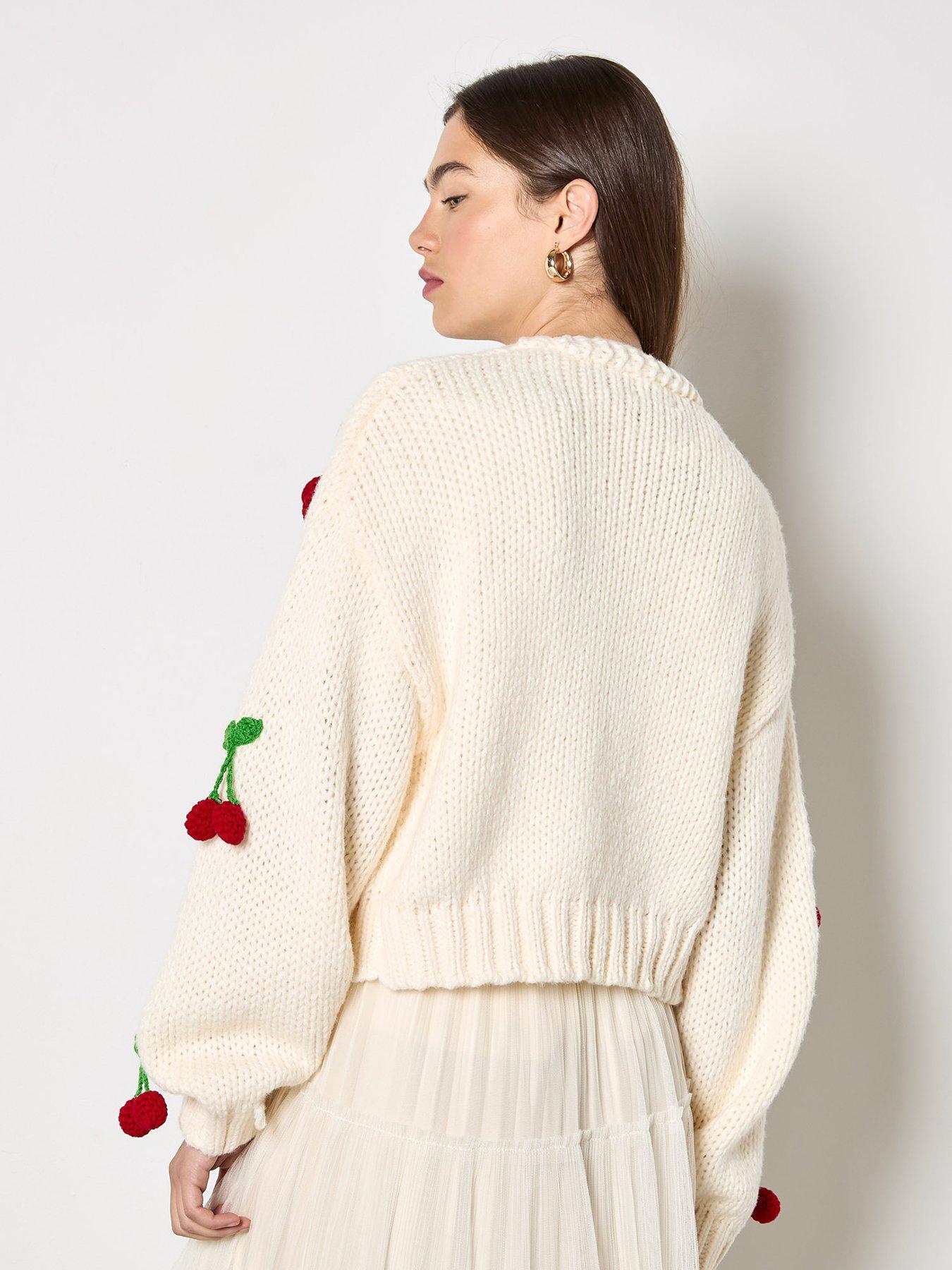  image of apricot-knitted-cherries-open-cardigan-cream