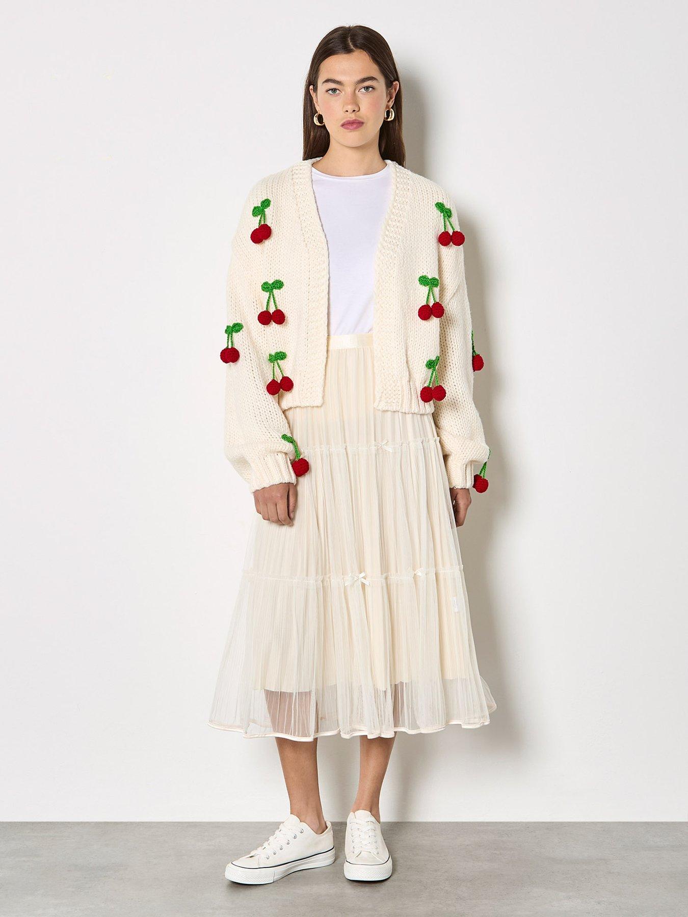  image of apricot-knitted-cherries-open-cardigan-cream