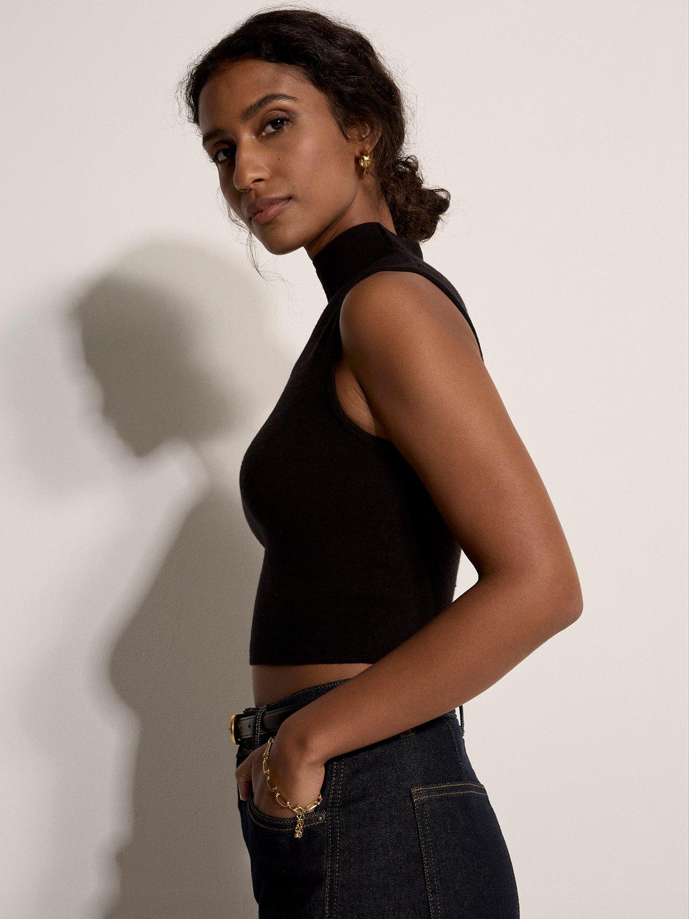  image of apricot-high-neck-knitted-crop-top-black