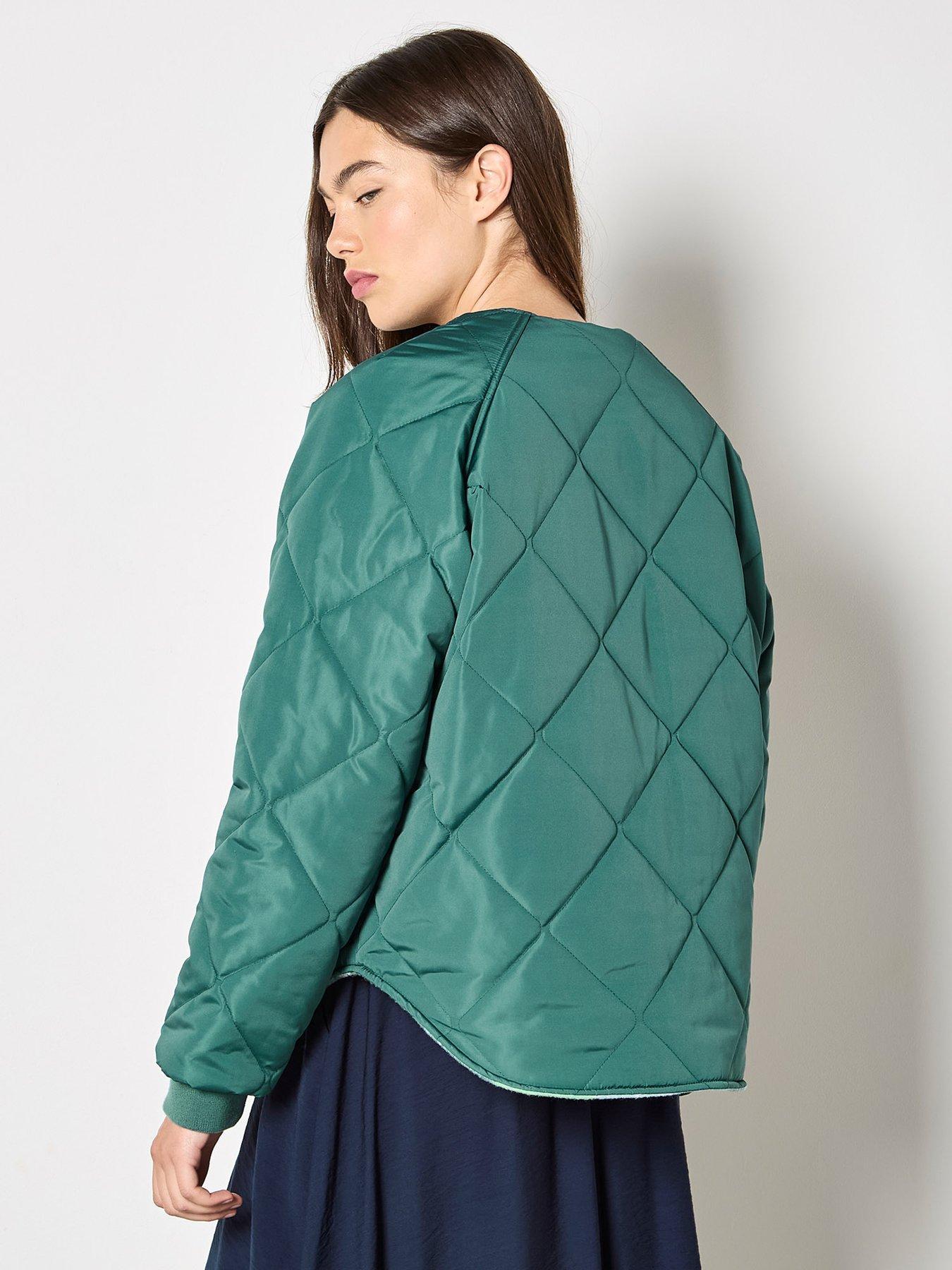  image of apricot-check-fleece-reversible-quilted-jacket-green