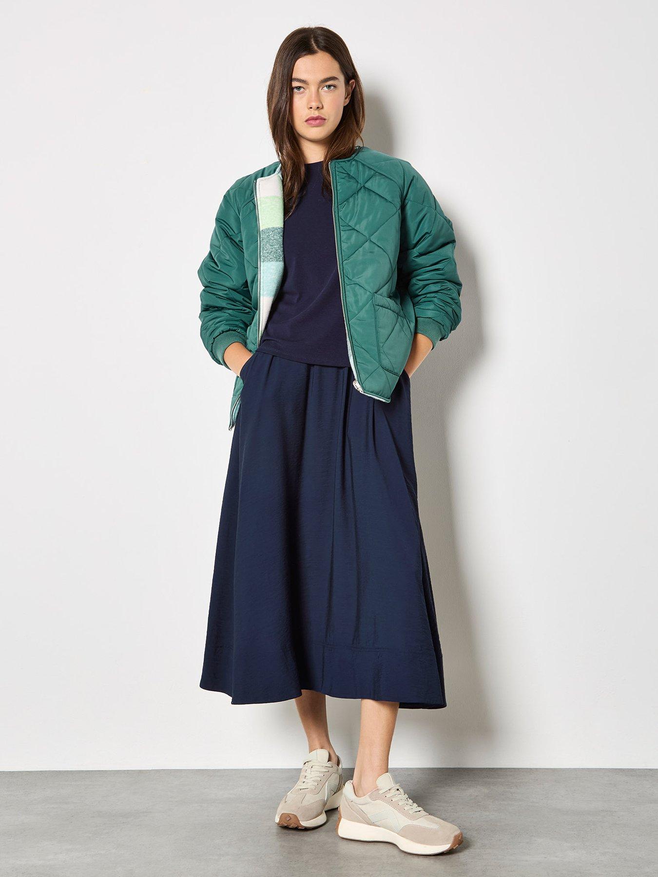  image of apricot-check-fleece-reversible-quilted-jacket-green