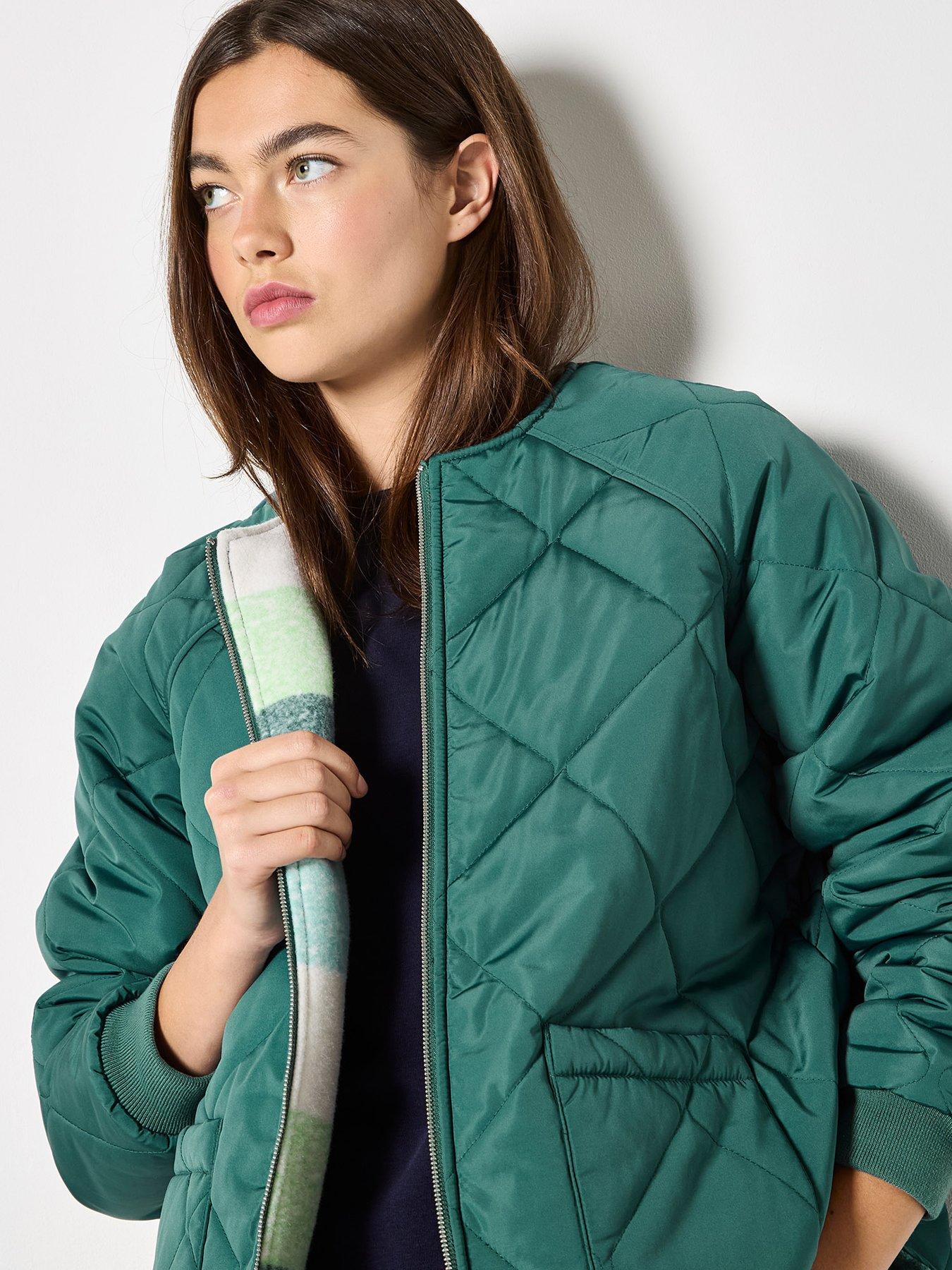 image of apricot-check-fleece-reversible-quilted-jacket-green