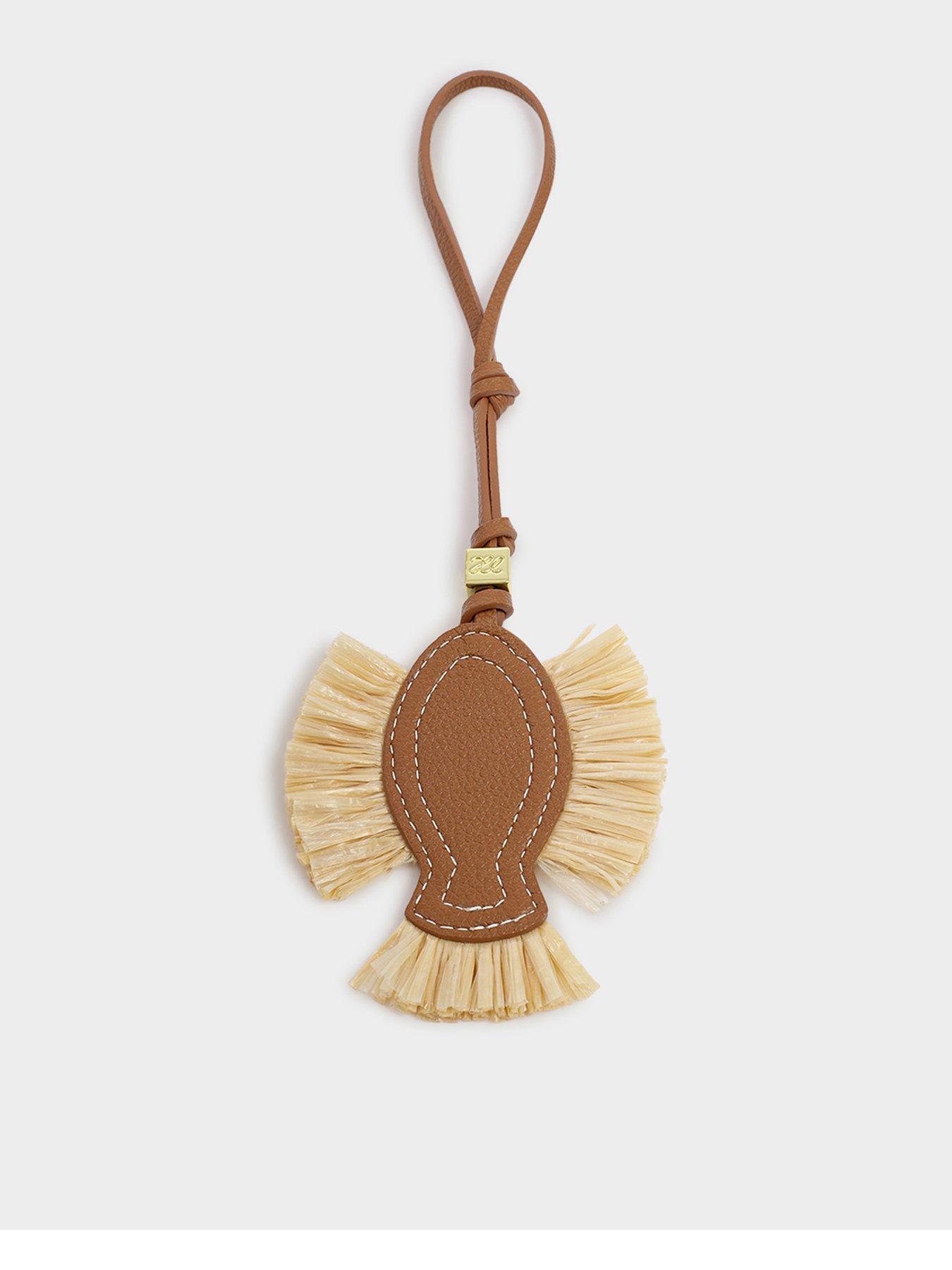  image of katie-loxton-raffia-fish-bag-charm-cognac-raffia
