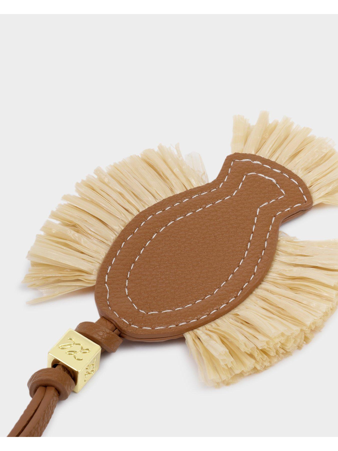  image of katie-loxton-raffia-fish-bag-charm-cognac-raffia