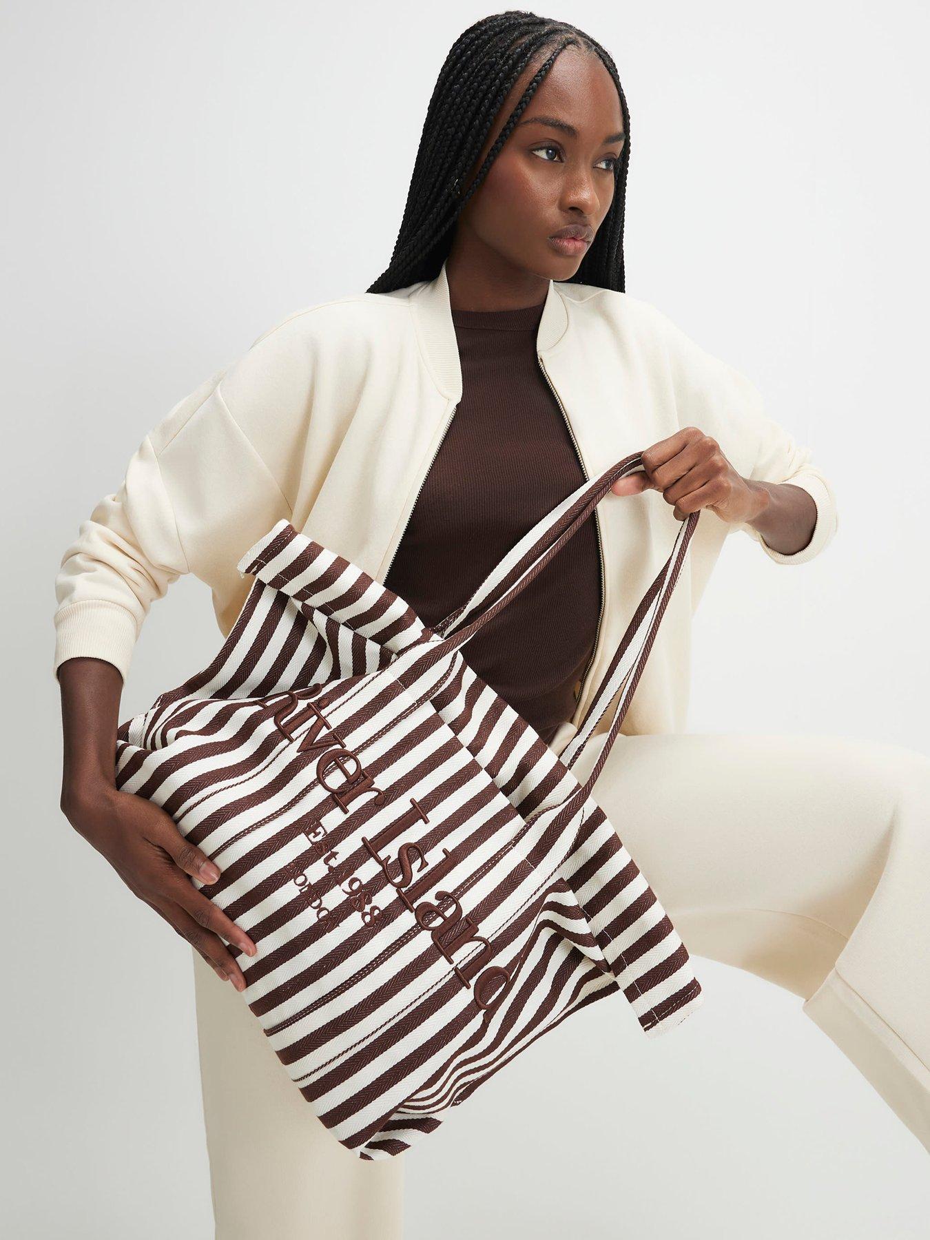 Image 1 of 6 of River Island Stripe Roll Top Bag - Brown