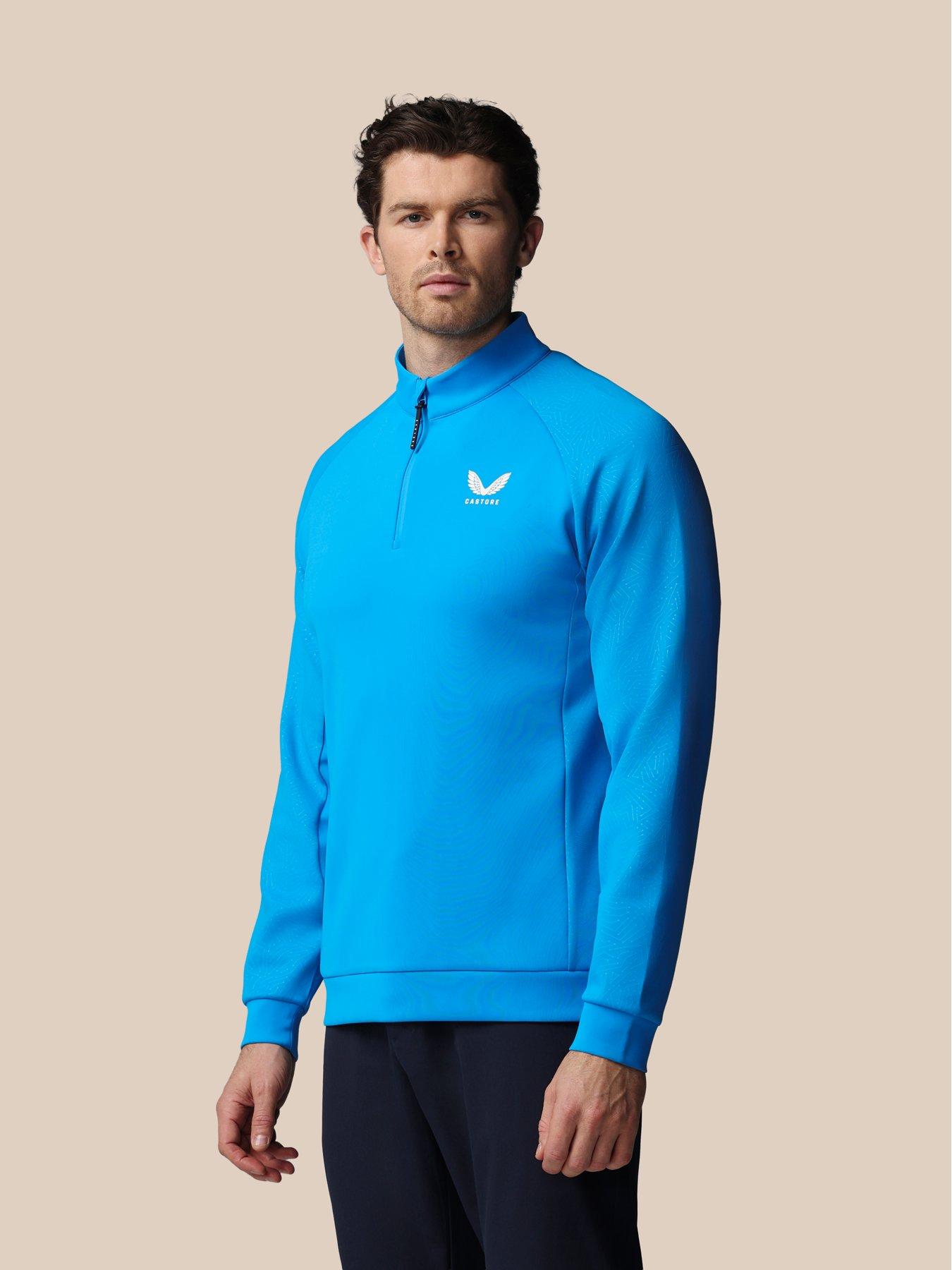 front image of castore-mens-golf-flex-debossed-14-zip-top--blue