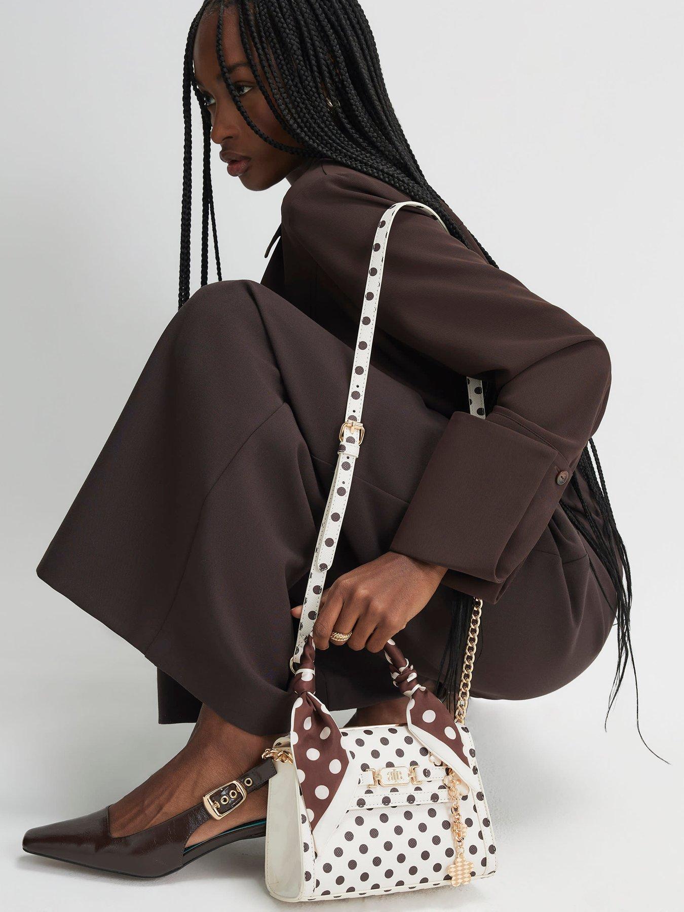 Image 1 of 6 of River Island Polka Dot Mini Charm Tote Bag - Beige