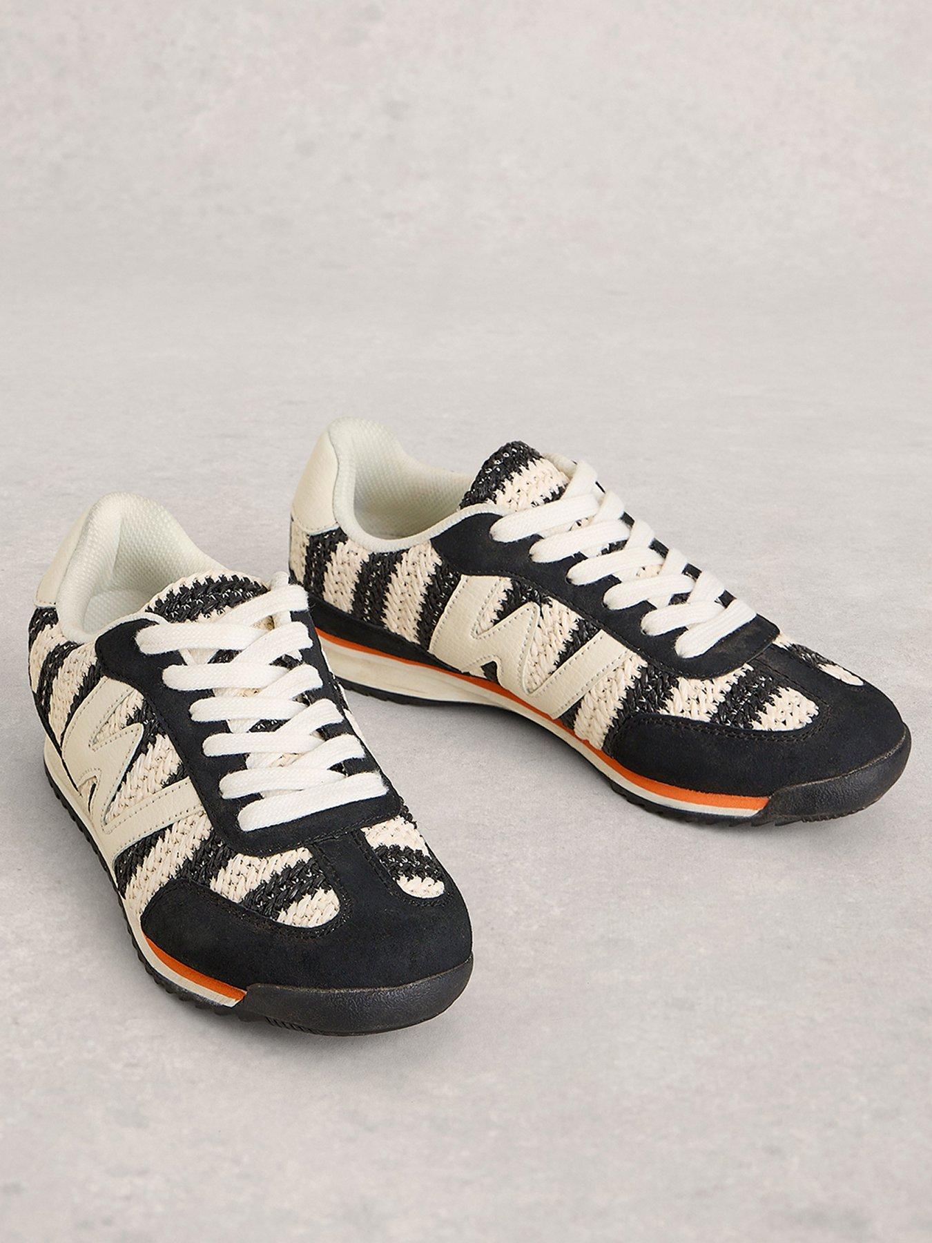 stillFront image of white-stuff-lucy-trainer-black