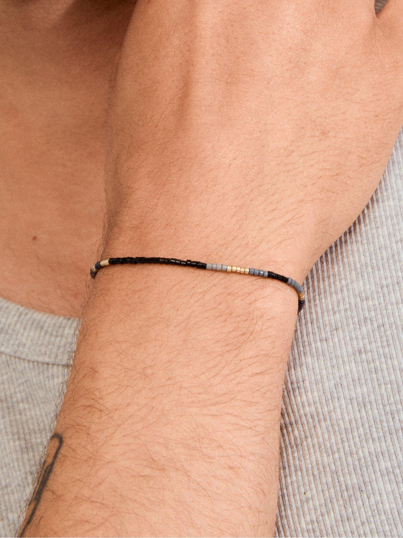  image of pilgrim-alison-bracelet-black-gold-plated