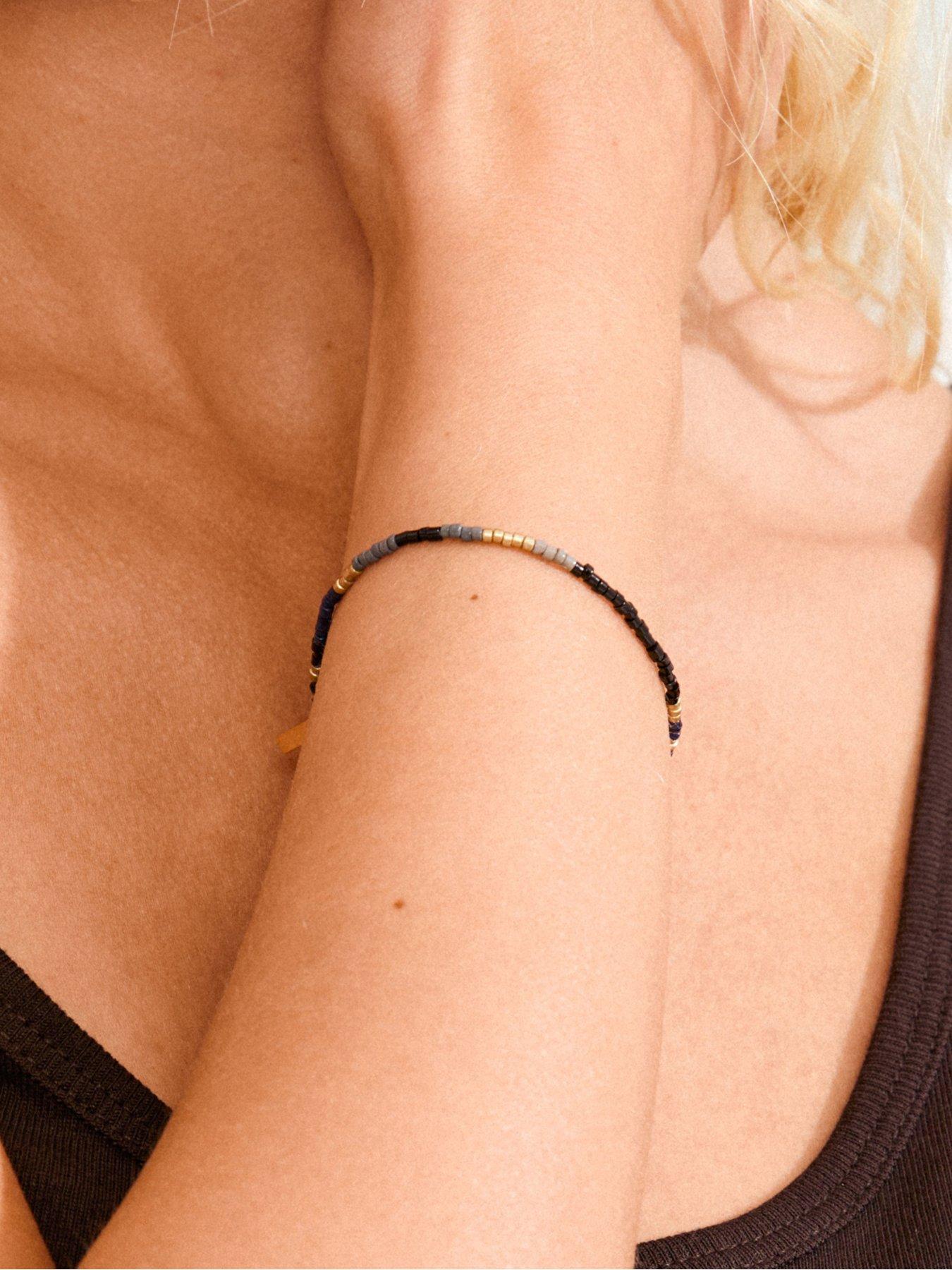  image of pilgrim-alison-bracelet-black-gold-plated