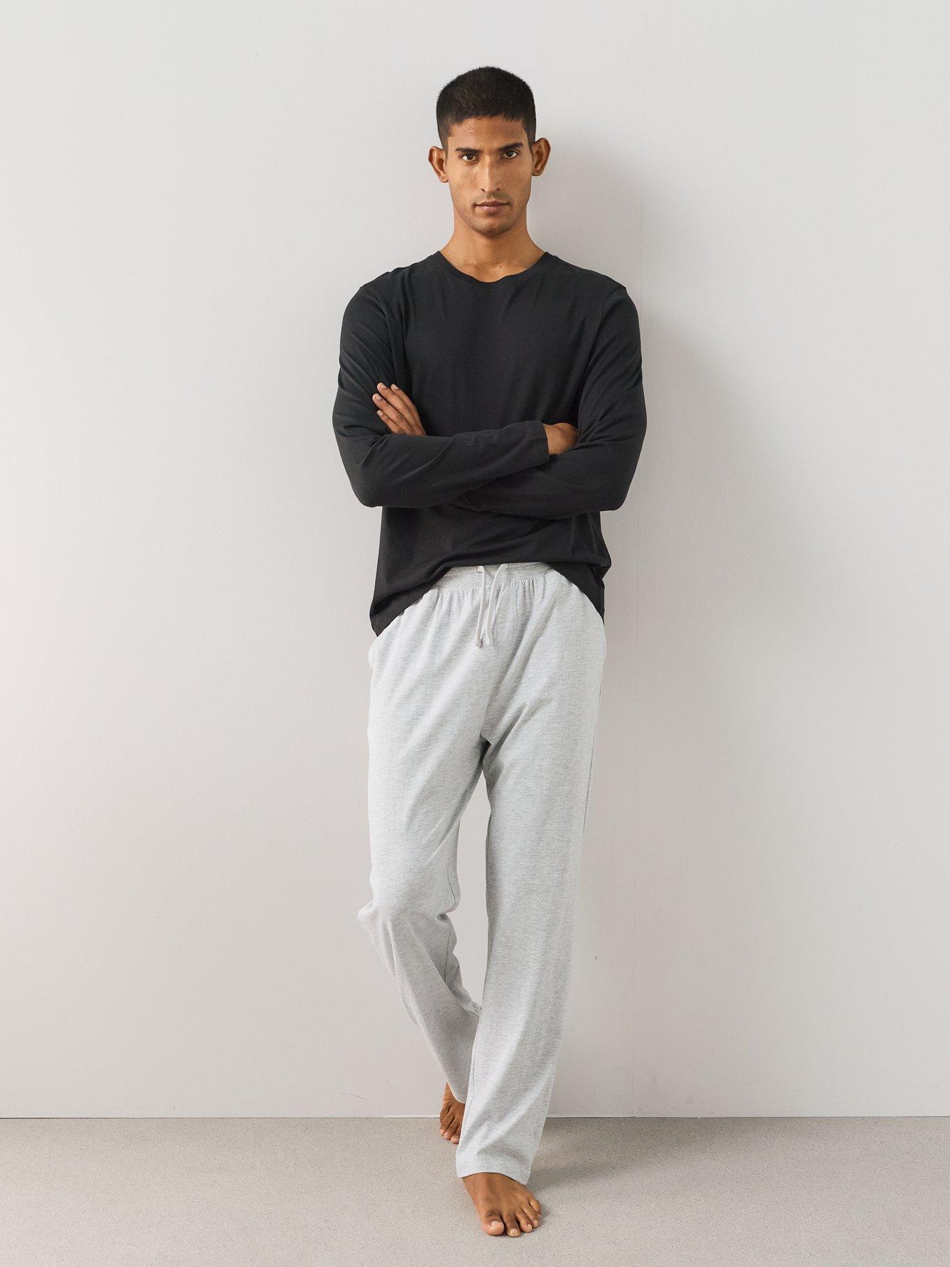 Image 1 of 7 of The Very Collection Essential Long Sleeve T-shirt &amp; Trouser Pyjama Set - Black/Grey