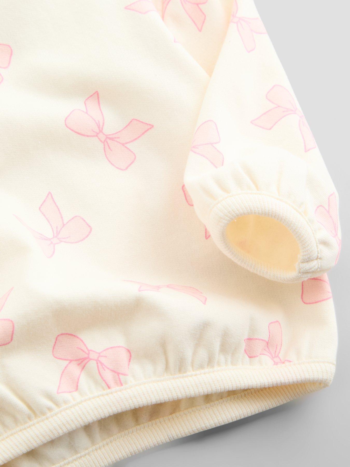 Image 6 of 6 of The Very Collection Baby Girls Bow Print Jog Set (0-3 months - 18-24 months) - Cream