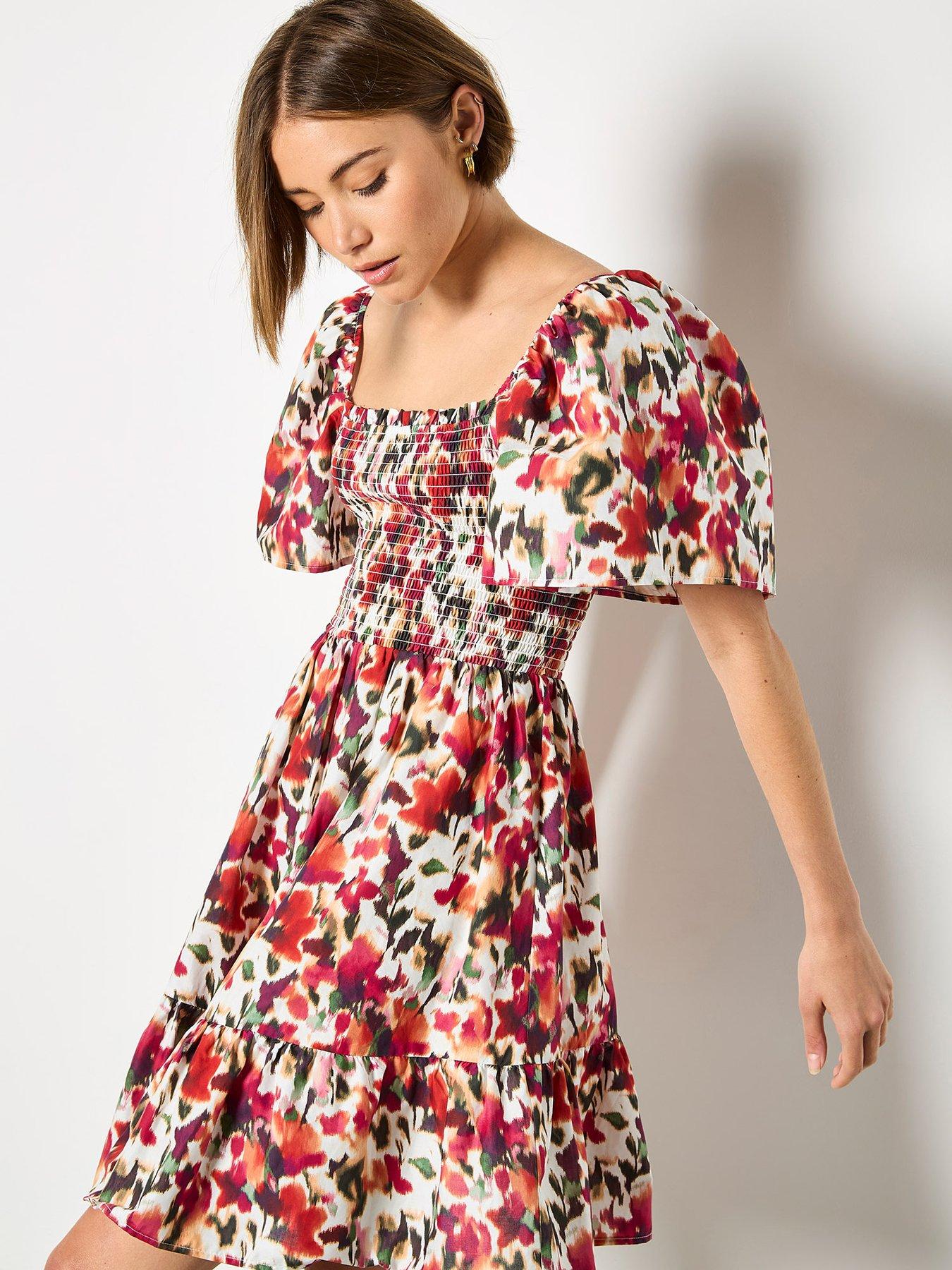 apricot-smocked-ikat-floral-cotton-drs
