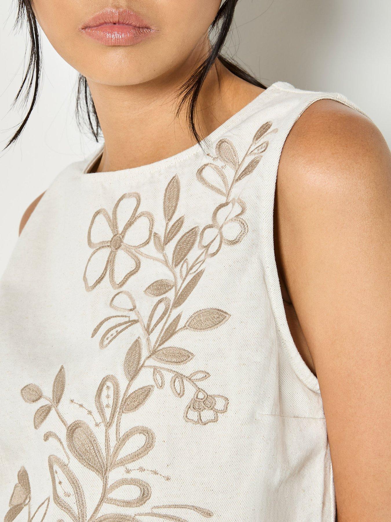 Image 4 of 4 of Apricot Embroidered Front Shell Top
