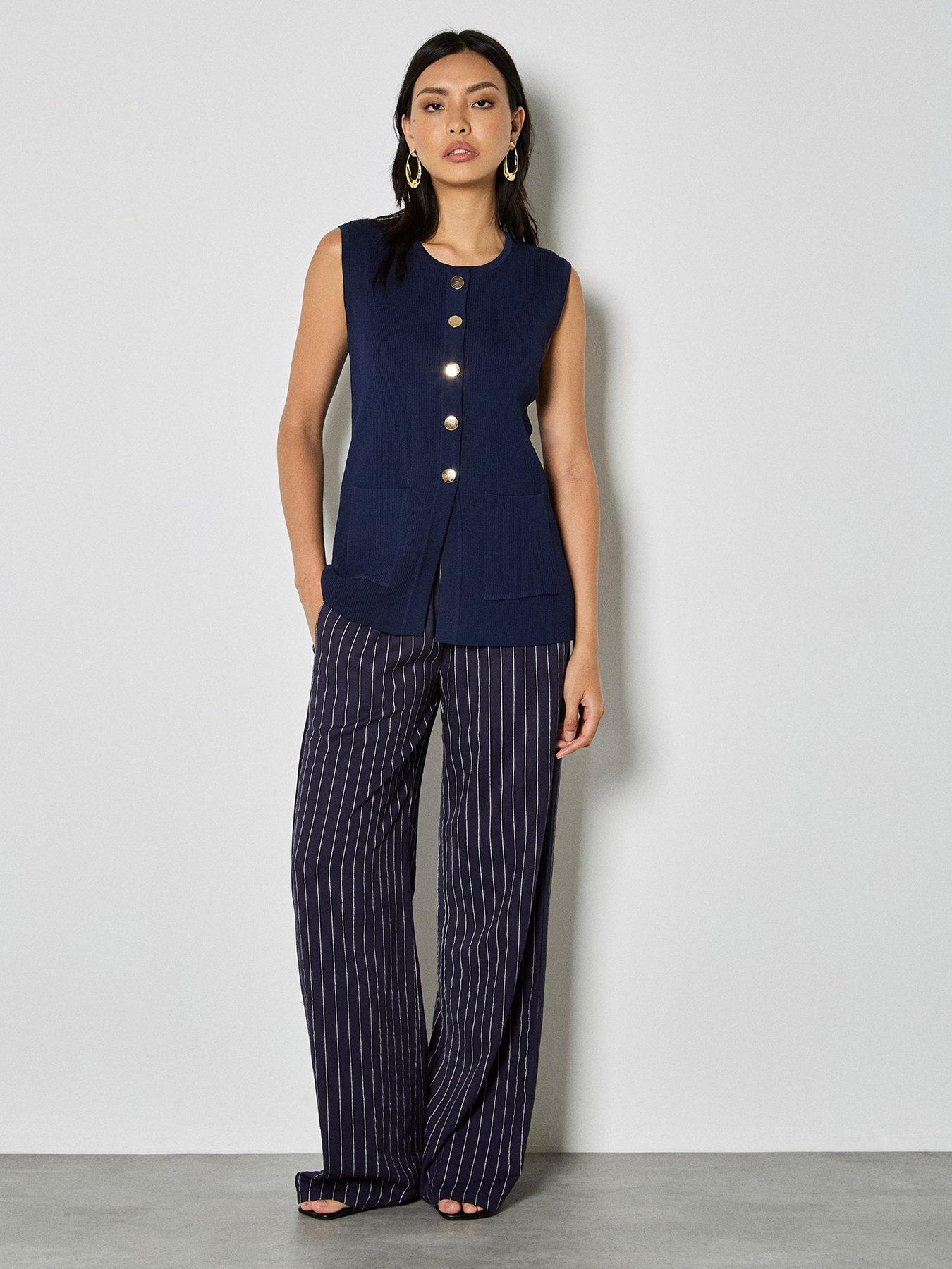  image of apricot-gold-btn-ribbed-two-pocket-waistcoat