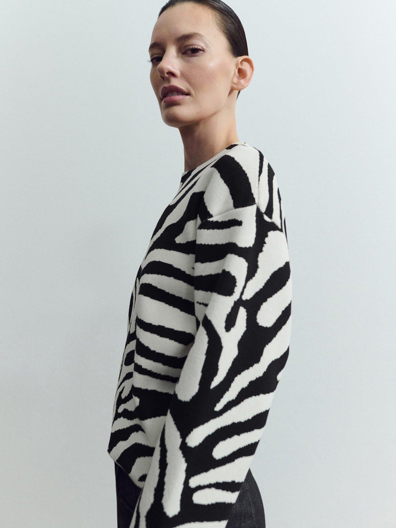  image of mango-zebra-print-knitted-jumper-black
