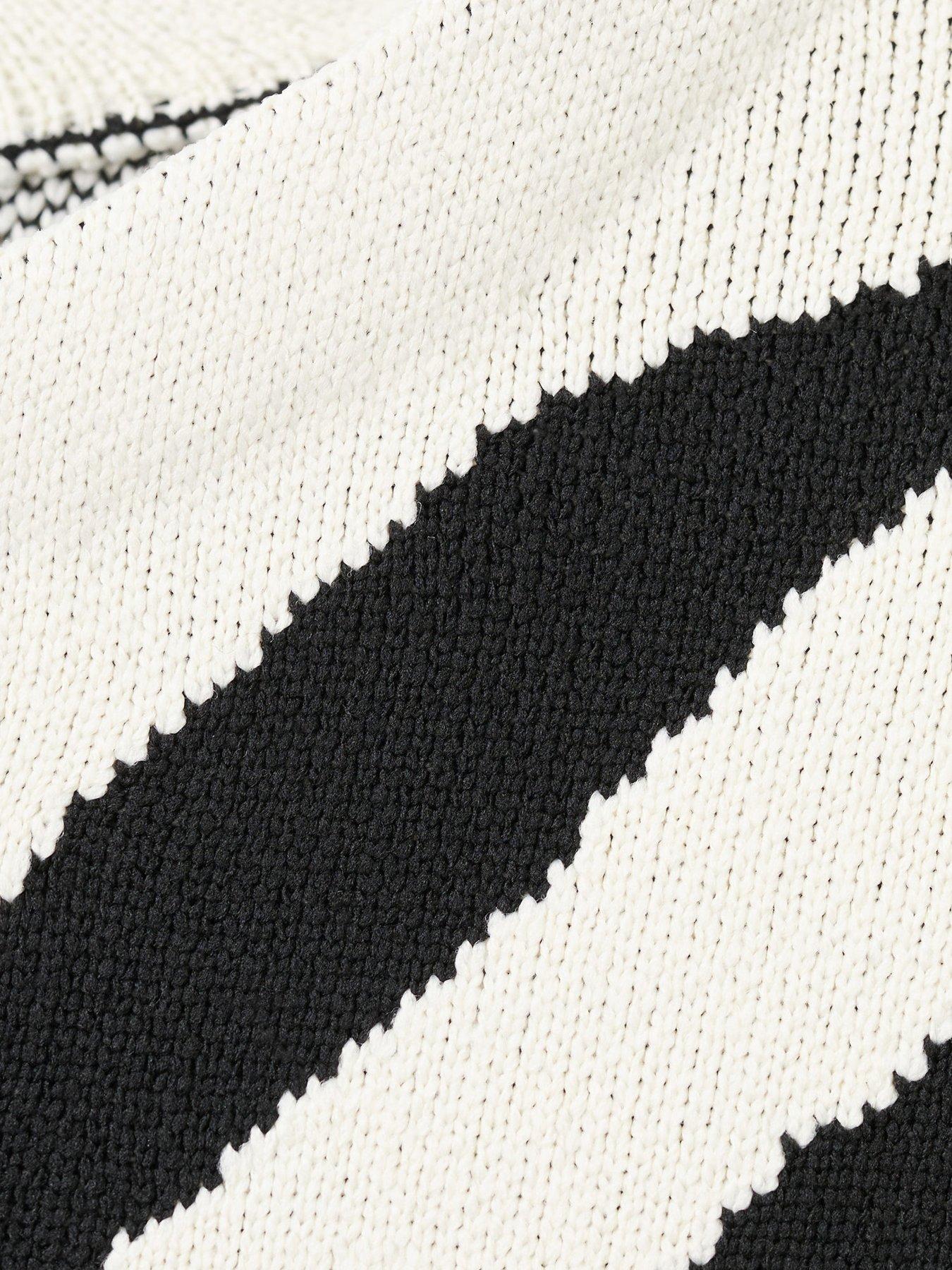  image of mango-zebra-print-knitted-jumper-black