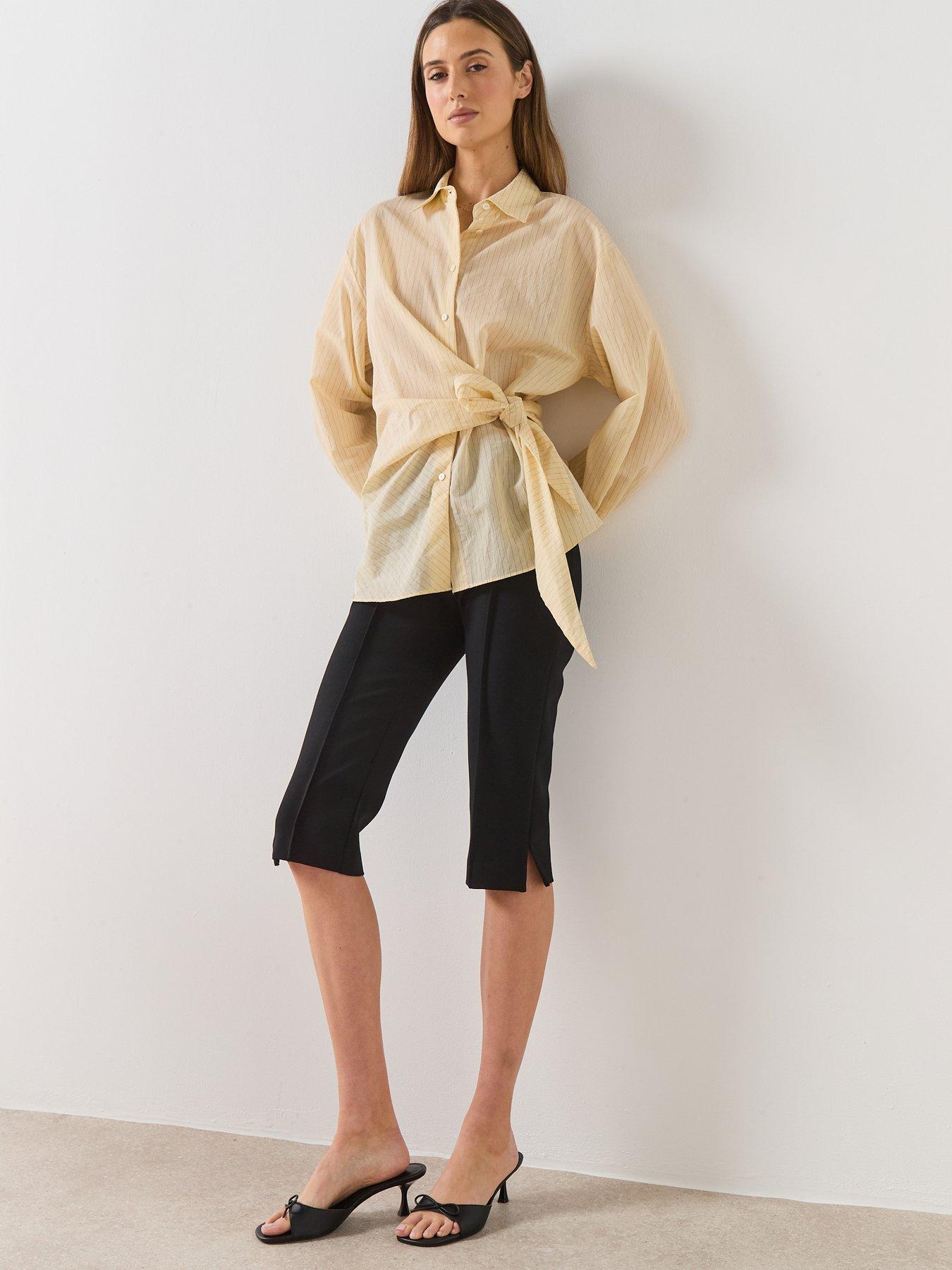  image of mango-stripped-knot-shirt-yellow
