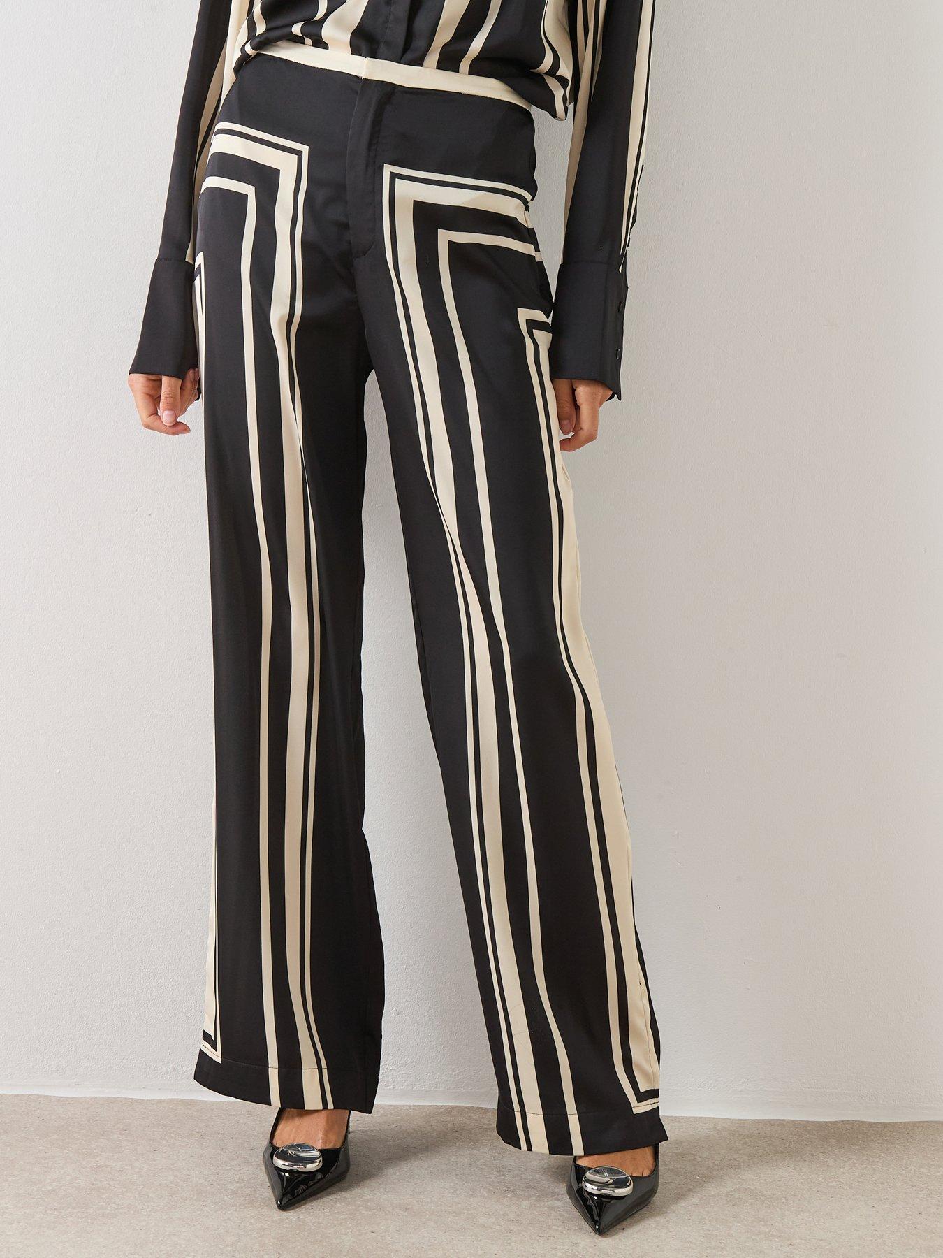 Image 1 of 6 of Mango Satin Printed Trousers - Black