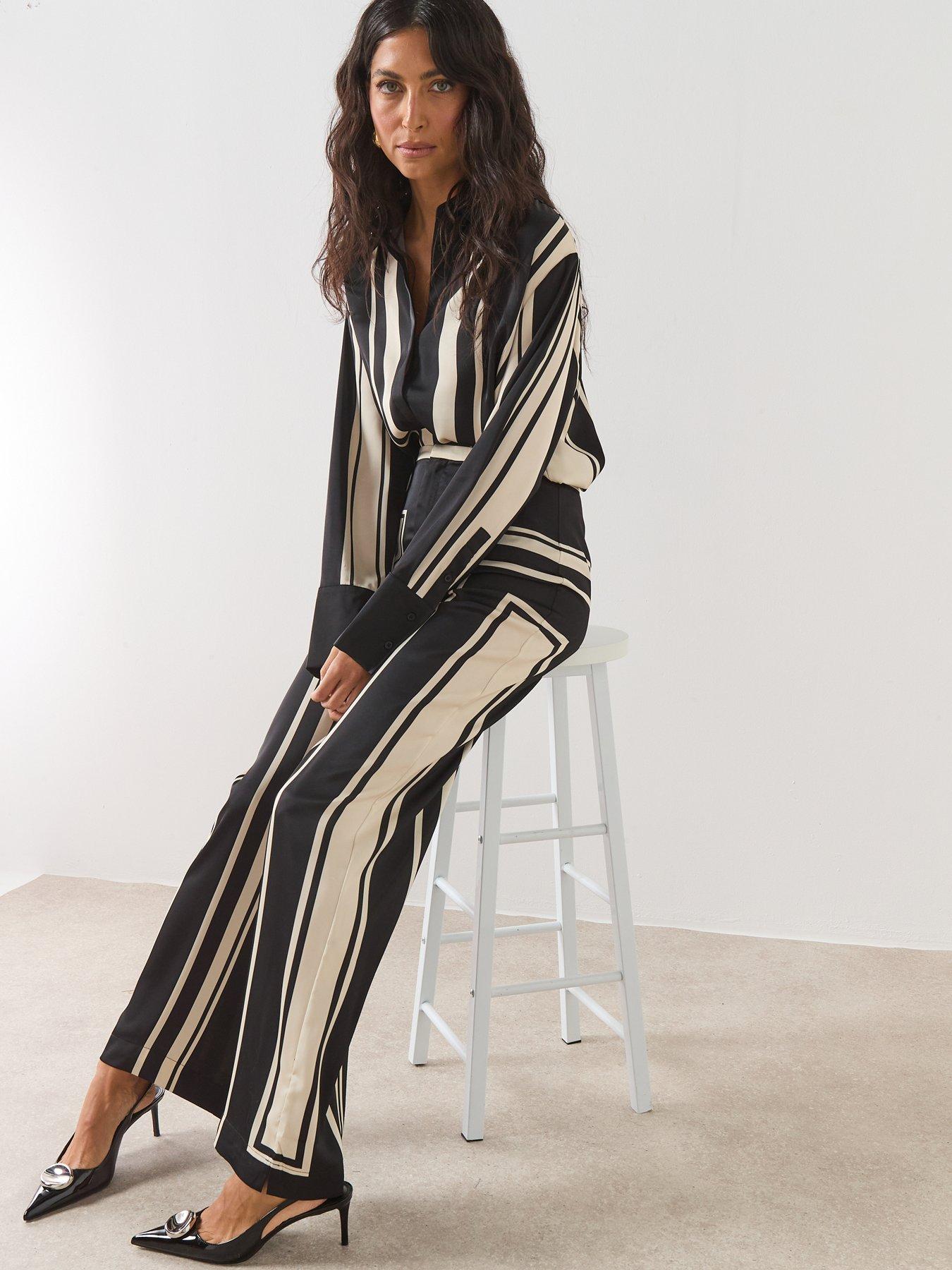  image of mango-satin-printed-trousers-black